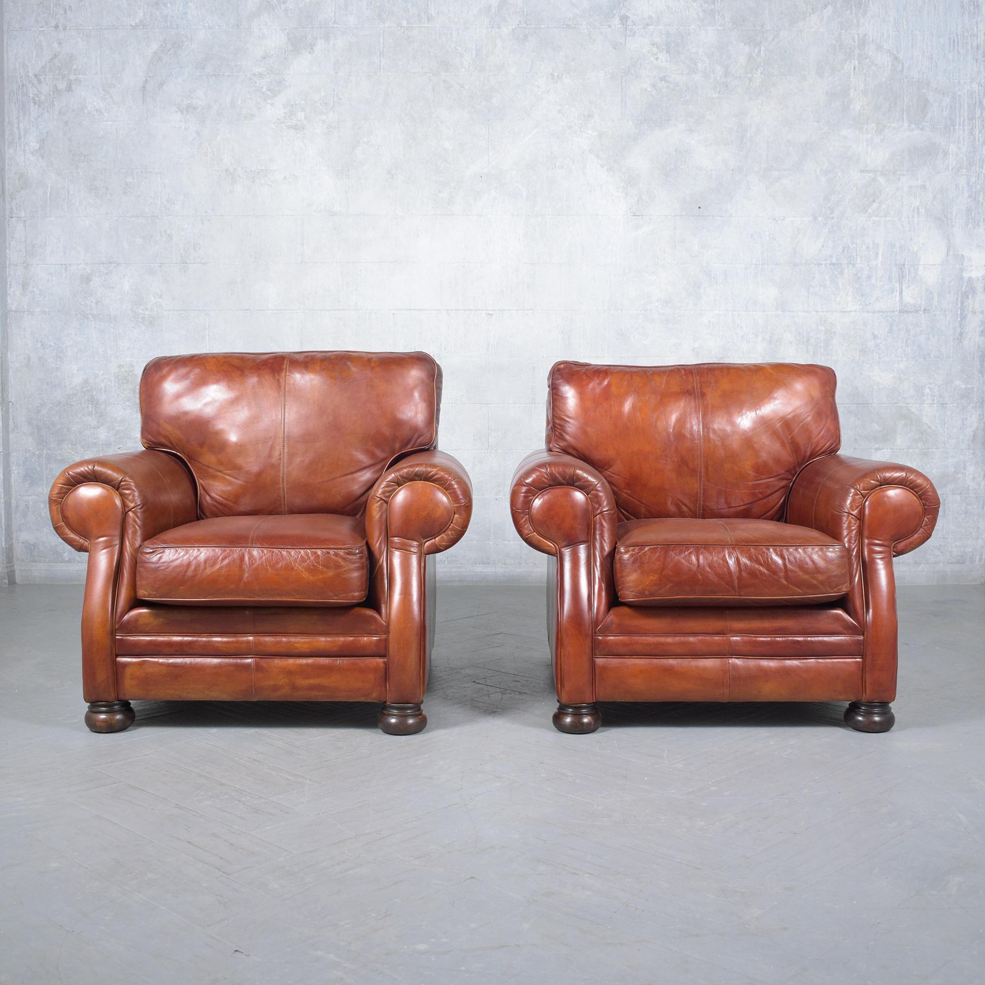 Discover the unmatched charm of our pair of vintage leather armchairs, beautifully crafted and meticulously restored by our professional expert craftsman team. These vintage club chairs are a testament to timeless design and exceptional