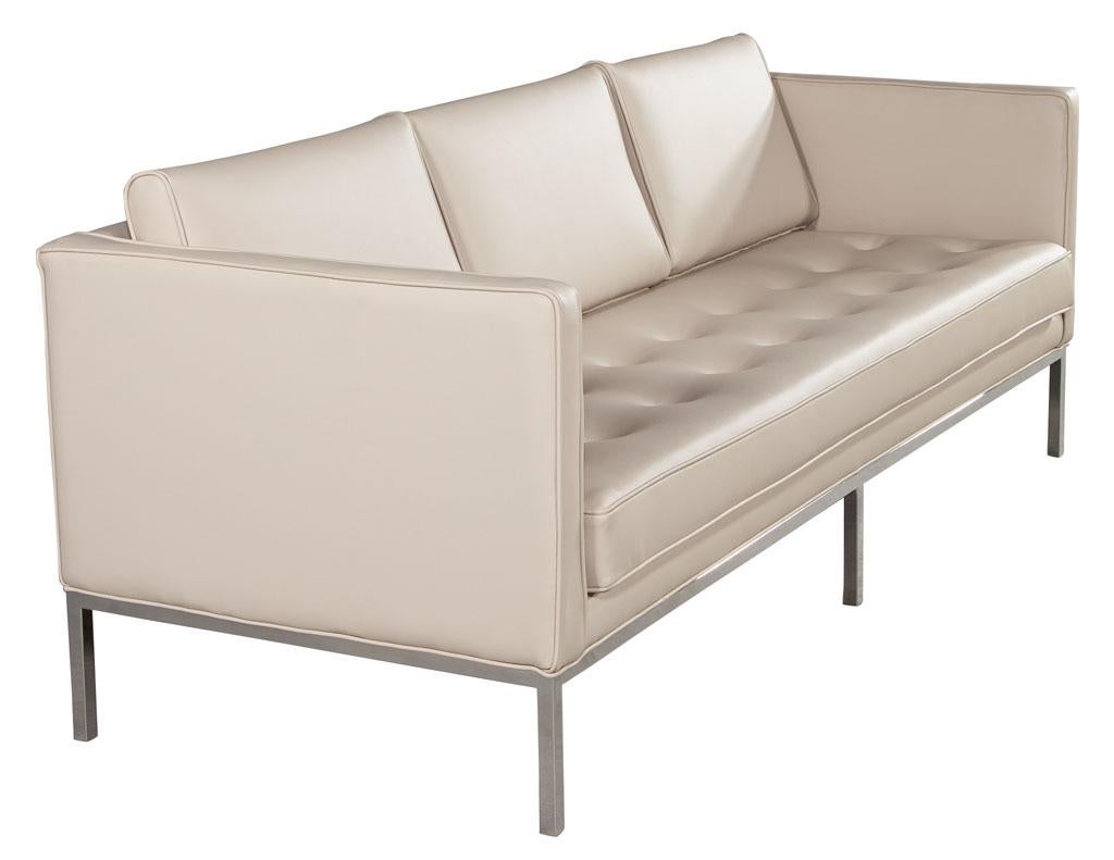 American Restored Vintage Mid-Century Modern Tufted Sofa in Cream Faux Leather