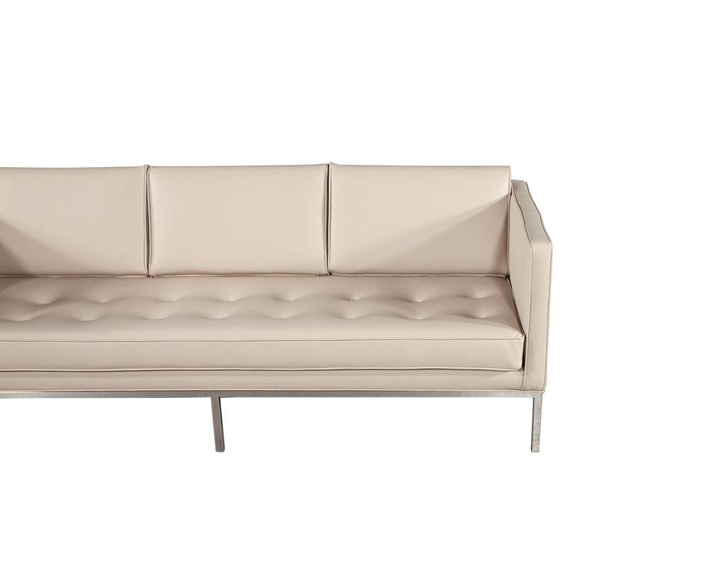 Late 20th Century Restored Vintage Mid-Century Modern Tufted Sofa in Cream Faux Leather