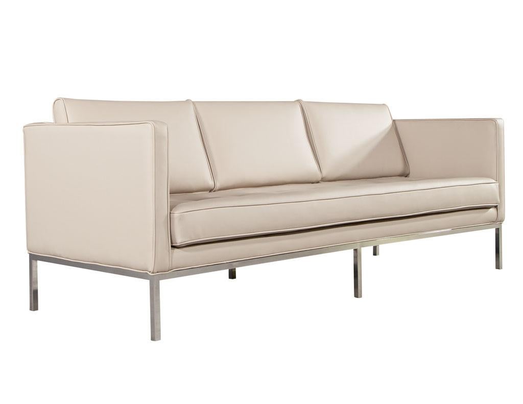 Stainless Steel Restored Vintage Mid-Century Modern Tufted Sofa in Cream Faux Leather
