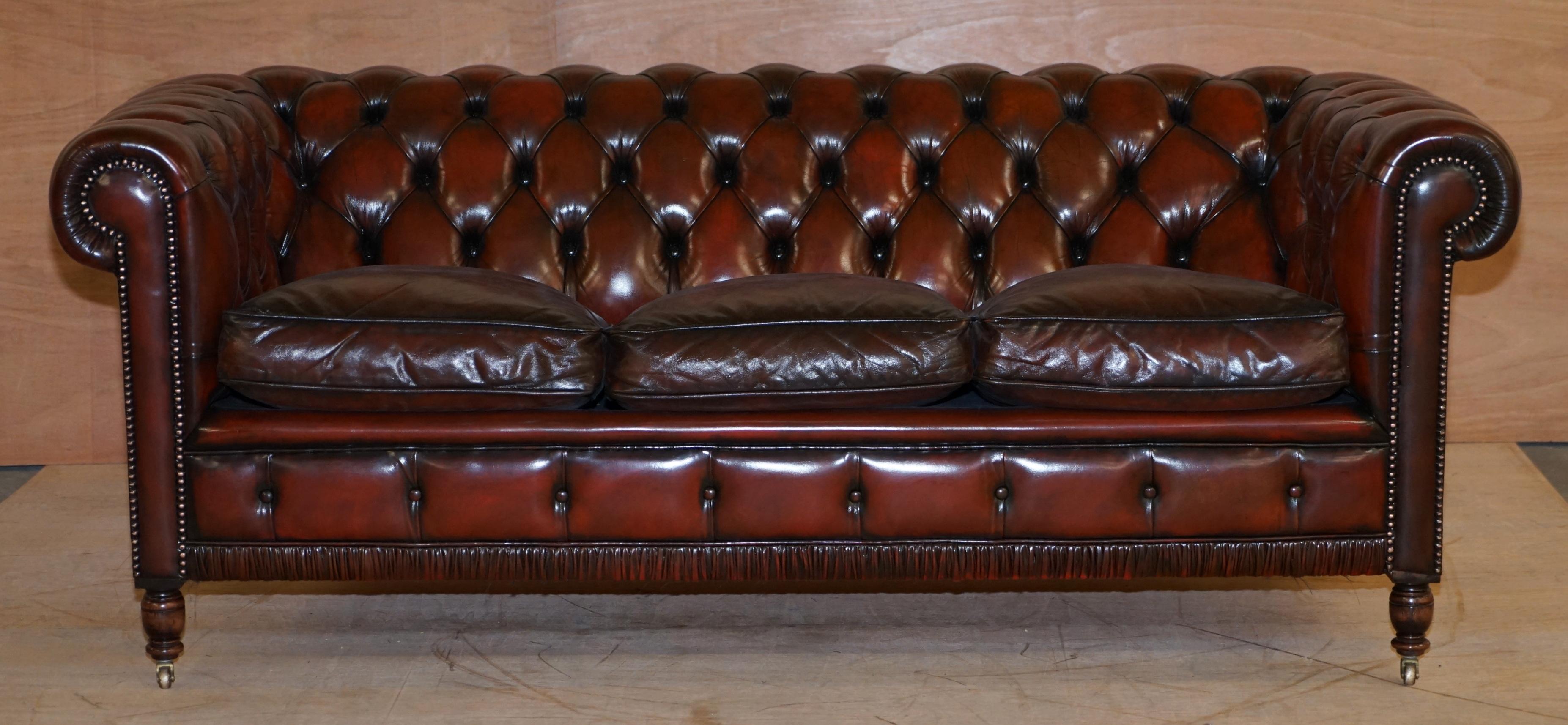 We are delighted to offer for sale this stunning very rare hand made in England fully restored Bordeaux leather Gentleman's club sofa

Where to begin! This sofa is absolute eye candy from every angle, it has the original leather hide, the leather