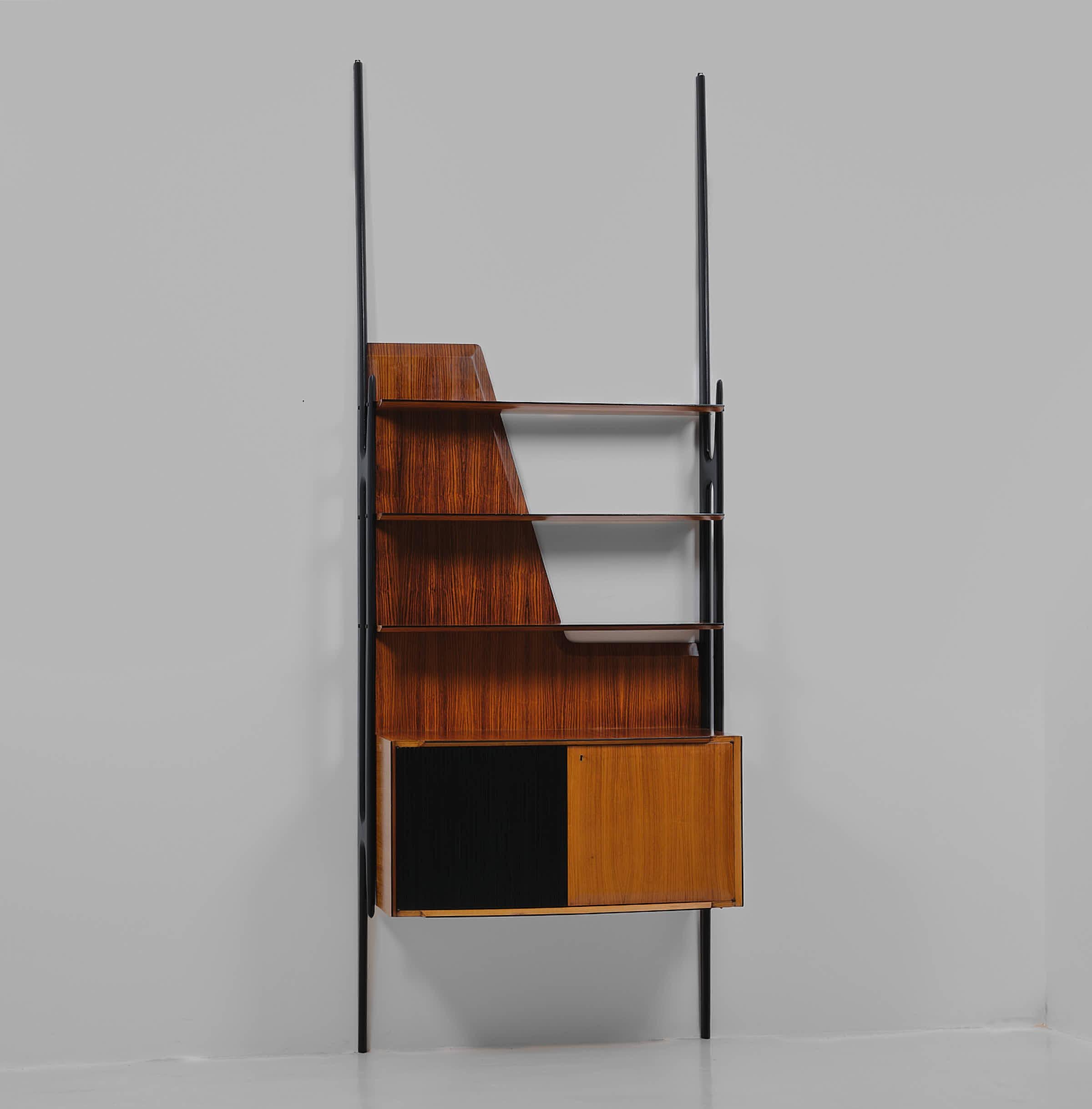 Experience the elegance of the 1950s with this restored wall unit designed by Vittorio Dassi, a true piece of Italian mid-century modern craftsmanship. Perfectly marrying form and function, this piece serves as both a wall unit and a bookcase,