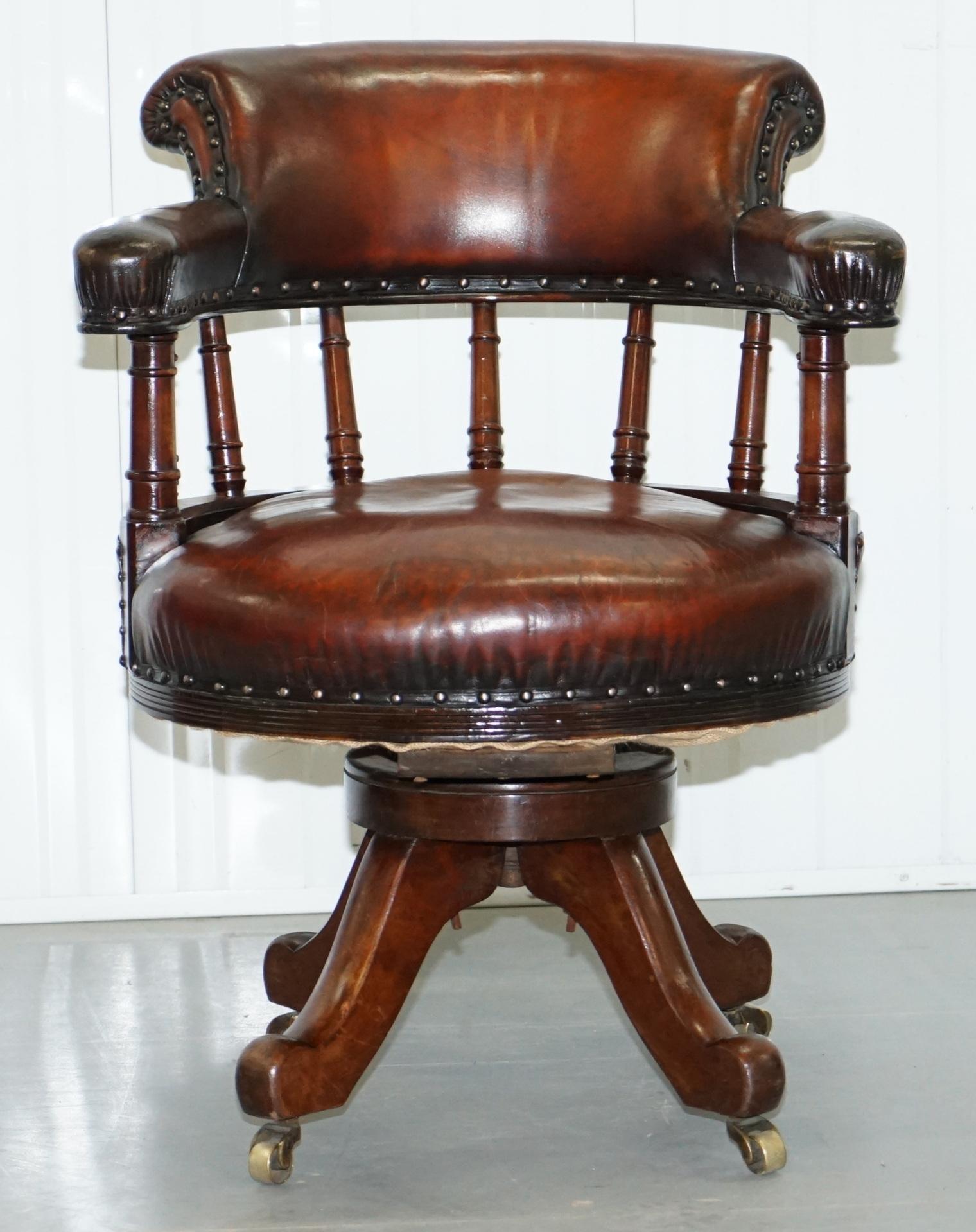 We are delighted to offer for sale this large fully restored Victorian, circa 1880 solid walnut framed Captains chair with hand dyed whiskey brown leather upholstery 

A very grand and well made piece, the swivel action operates as it should do,