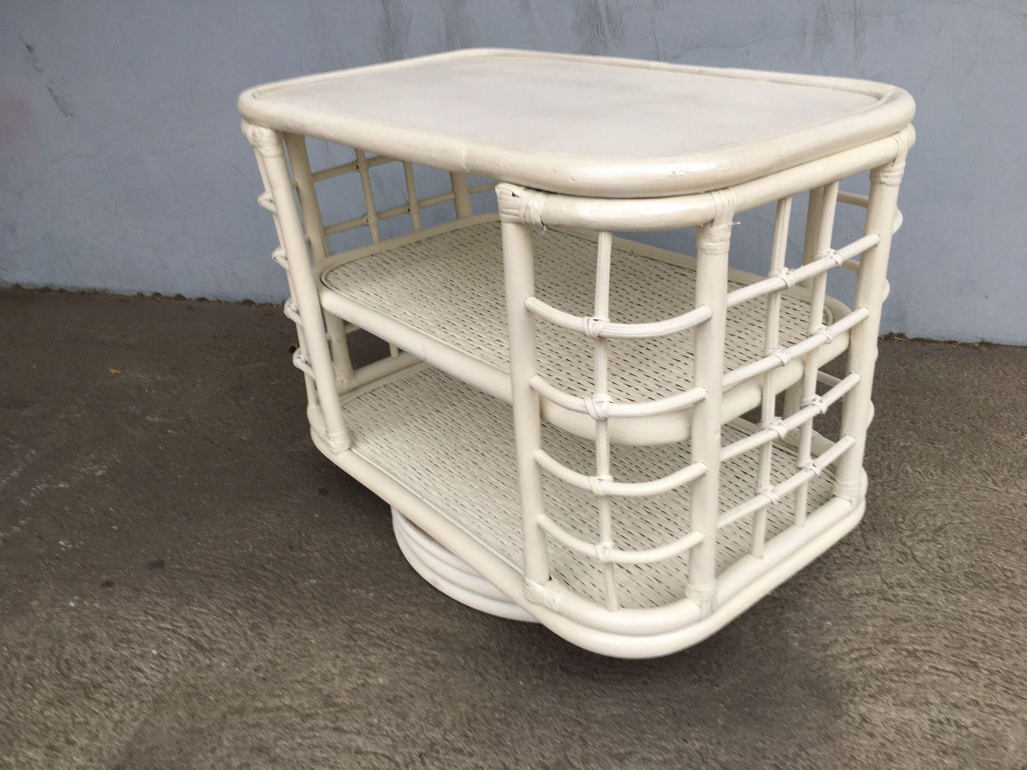Restored White Cage Rattan Side Table Swivel Bookshelf In Excellent Condition For Sale In Van Nuys, CA