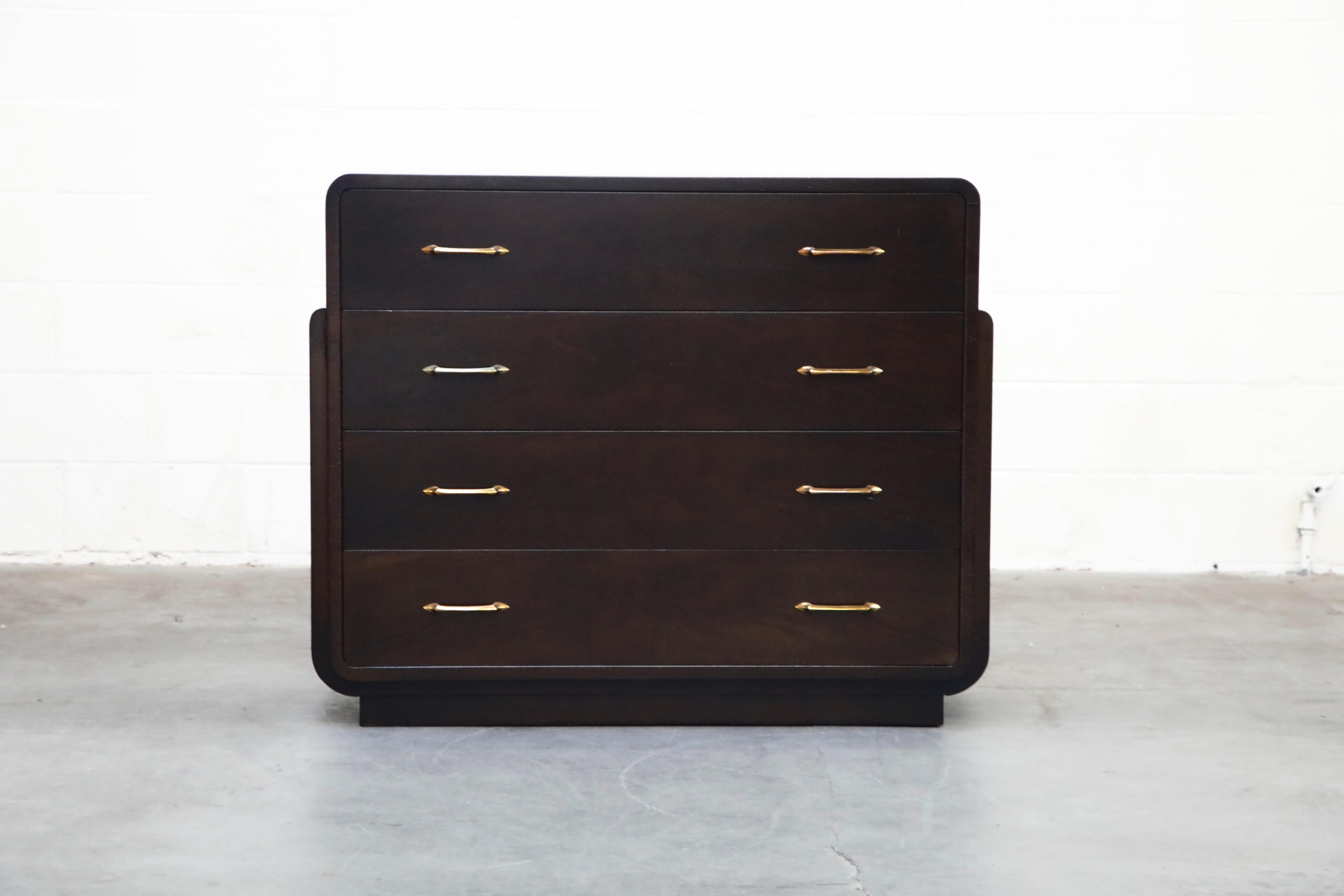 This fully-restored streamline Moderne Widdicomb dresser is attributed to Donald Deskey and signed with Widdicomb labels. This four drawer cabinet is most notable for its distinctive streamline Moderne / Art Deco styling and stylized brass drawer