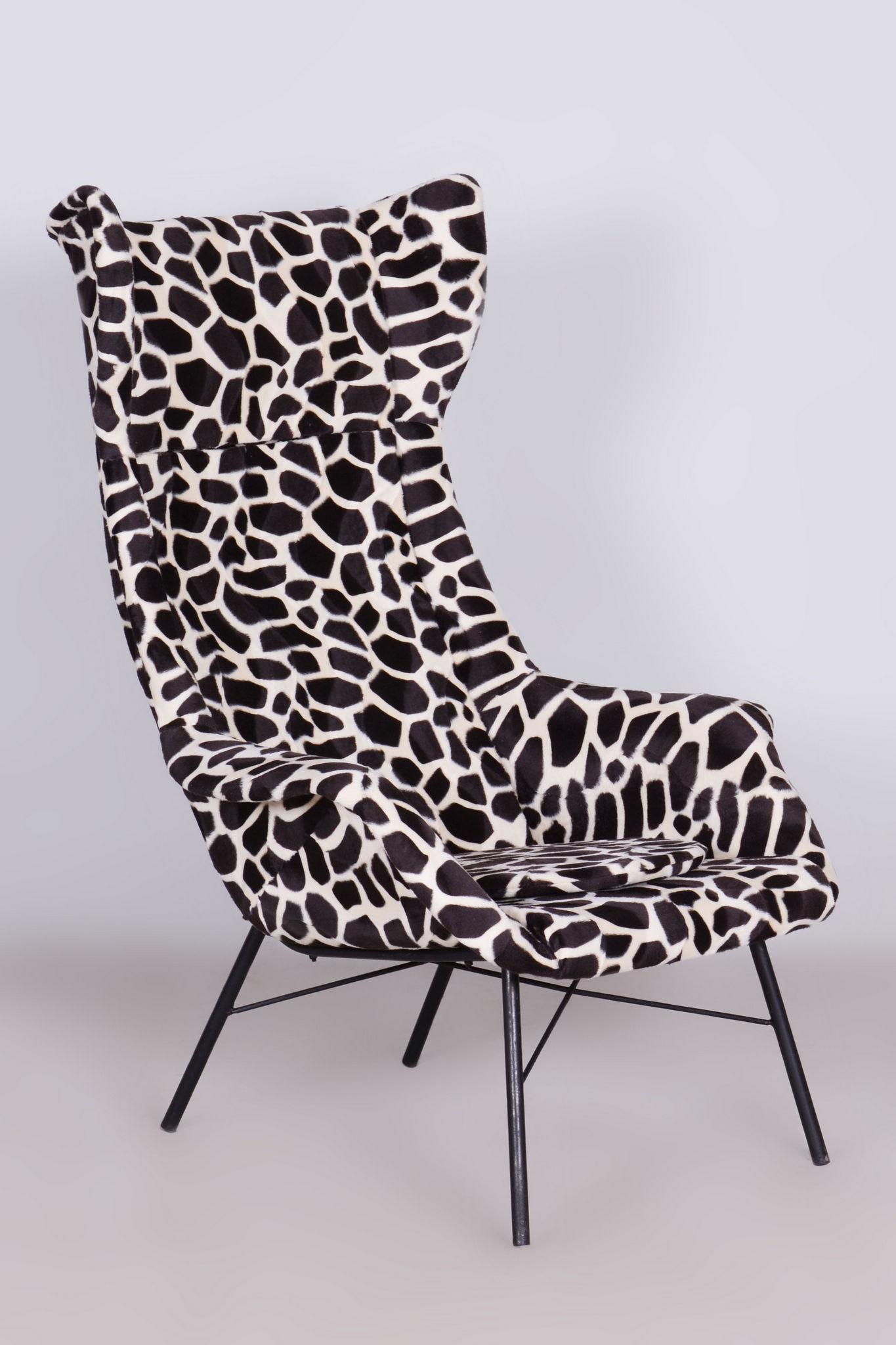Original midcentury wing chair.

Designer: Miroslav Navratil
Source: Czechia
Period: 1950-1959
Material: Laminat, Tubular construction

New upholstery in cover fabric with imitation giraffe fur.
According to the original process, our professional