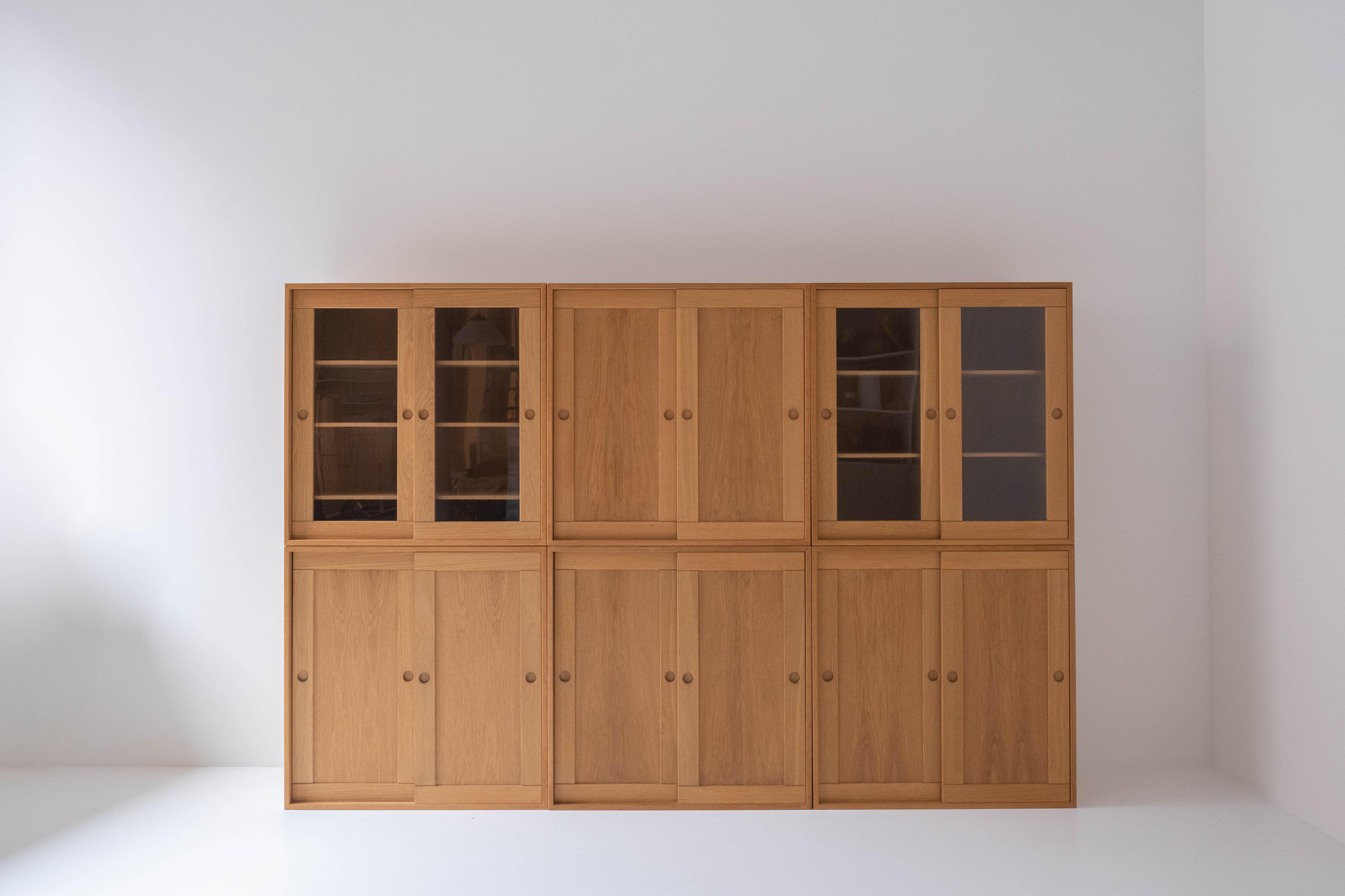 Storage unit by Børge Mogensen for Karl Andersson & Son, Sweden 1955. This modular ‘Øresund’ unit features 6 individual cabinets that can be positioned in any preferred composition. These cabinets are made out of oak and in overall well presented