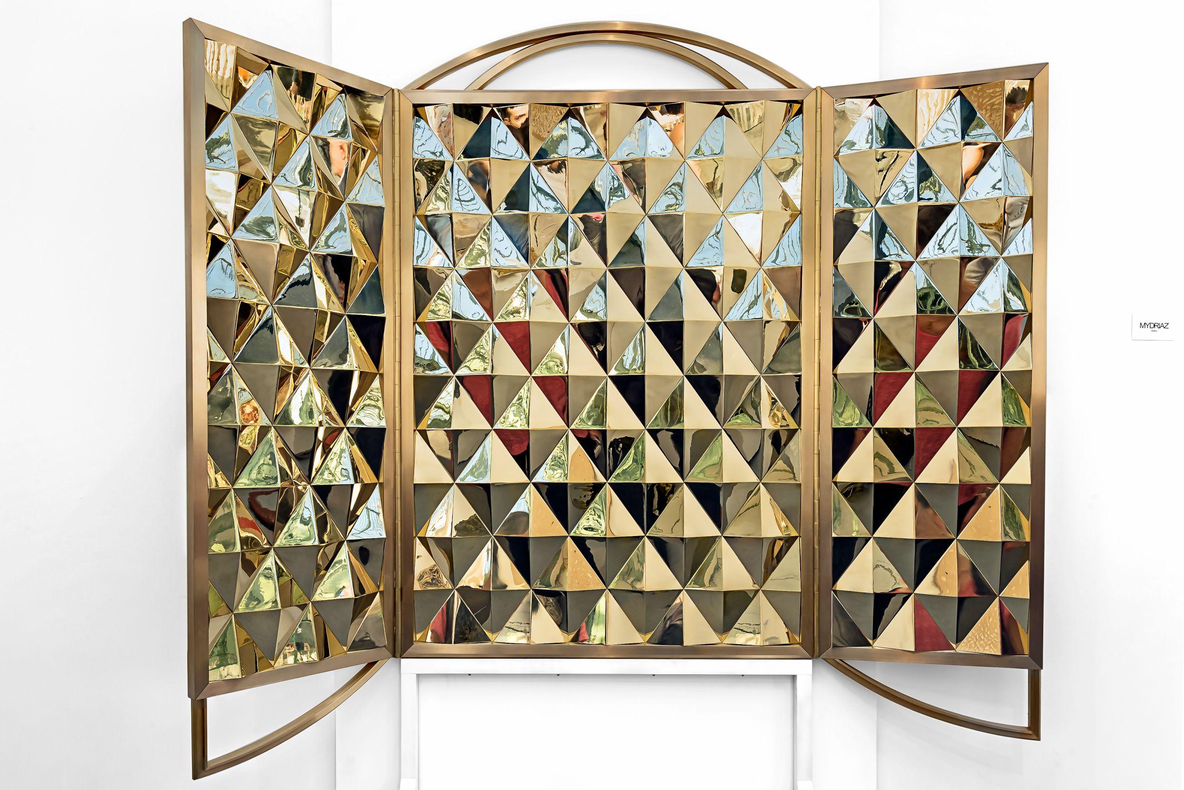 Retable mirror by MYDRIAZ
Dimensions: Open : W 165 x H 142 cm
 Closed : W 82.5 x H 142 cm
Materials: Brass
Finishes: Golden-plated polished brass, golden-plated or varnished brushed brass
75 kg

Our products are handmade in our workshop.
