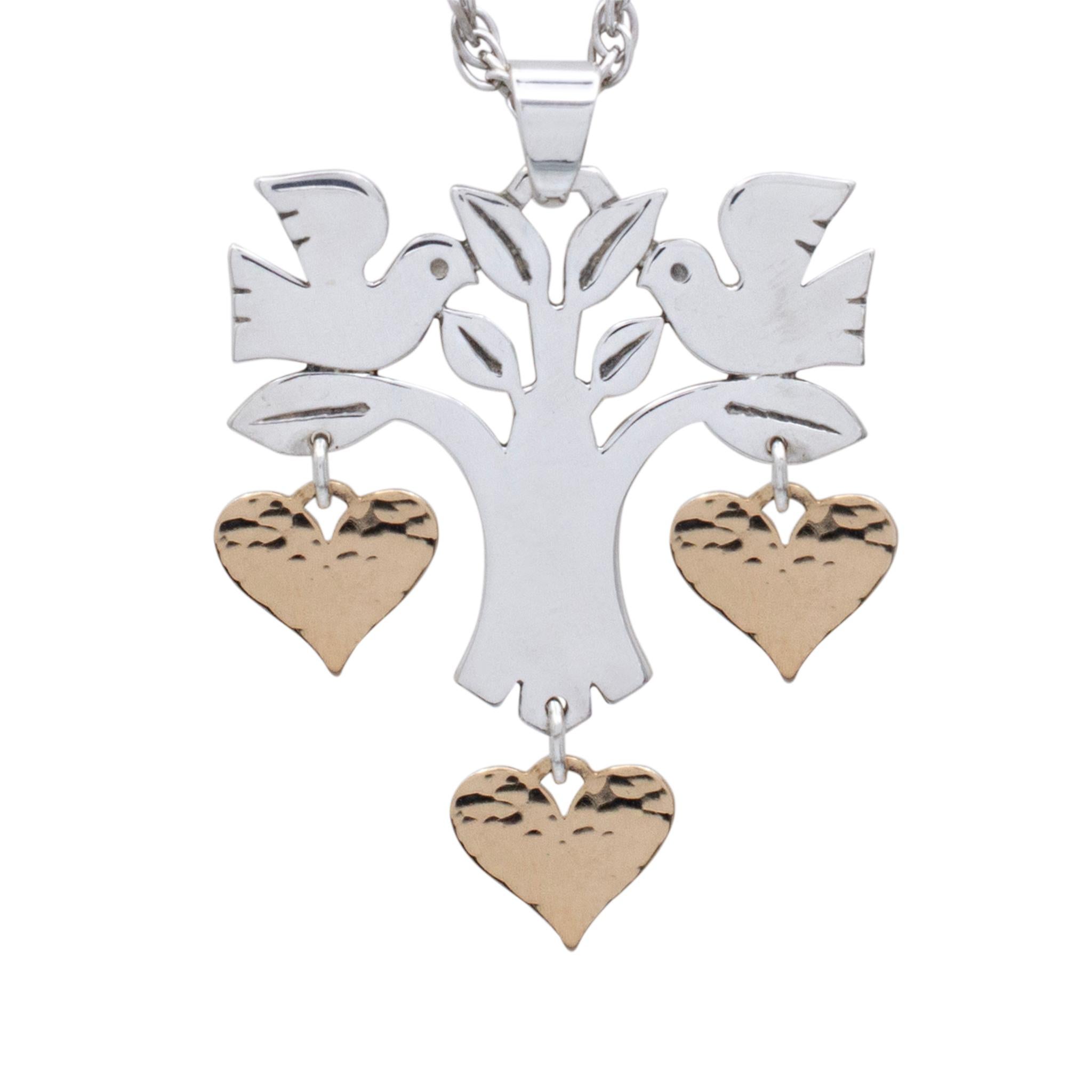 Marchio: James Avery

Collana Tipo di metallo: Argento 925

Lunghezza della collana: 19.00 pollici

Larghezza della collana: 2.50 mm

Peso della collana: 6,84 grammi

Tipo di metallo del ciondolo: Argento 925 e Oro giallo 14K

Lunghezza del