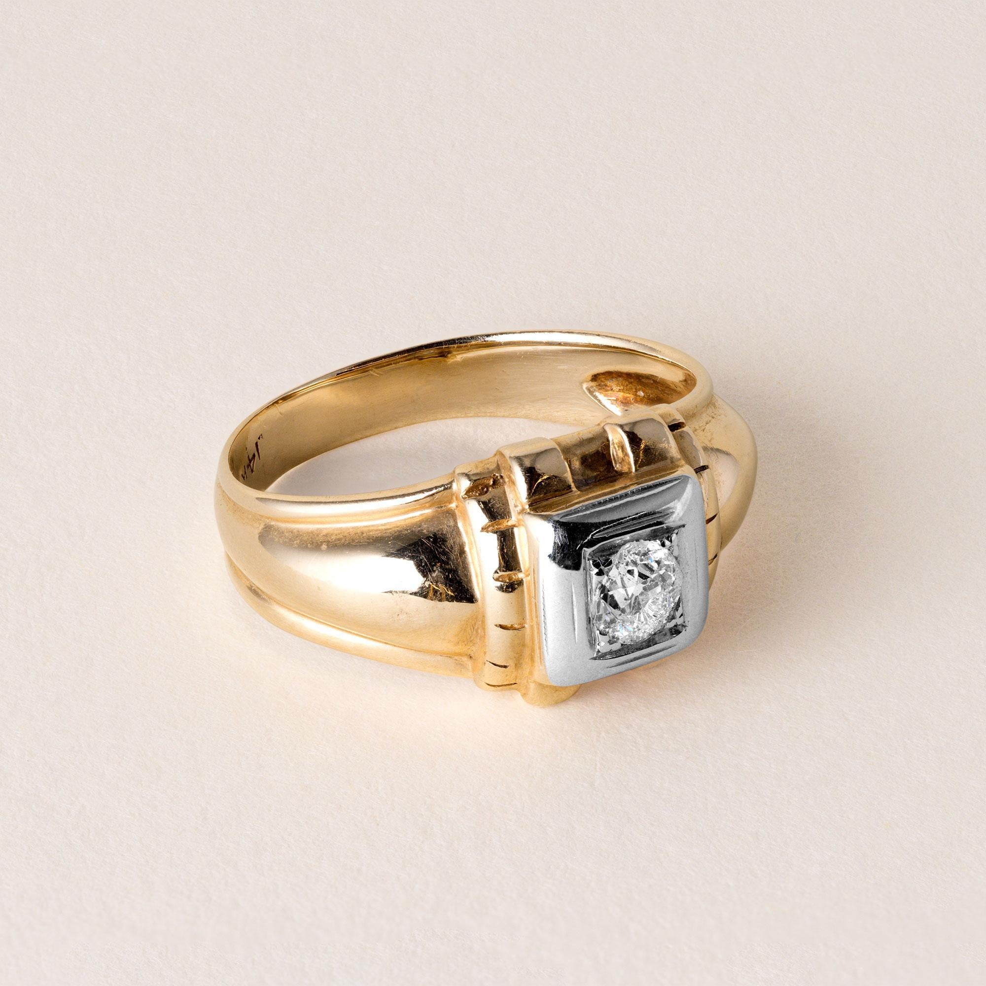 Circa 1940s
0.25 carat old mine cut diamond
F-G I1
set in white gold square frame
Ornate retro design band
4.4 grams
Ring size 7.25
Stamped 14K in shank