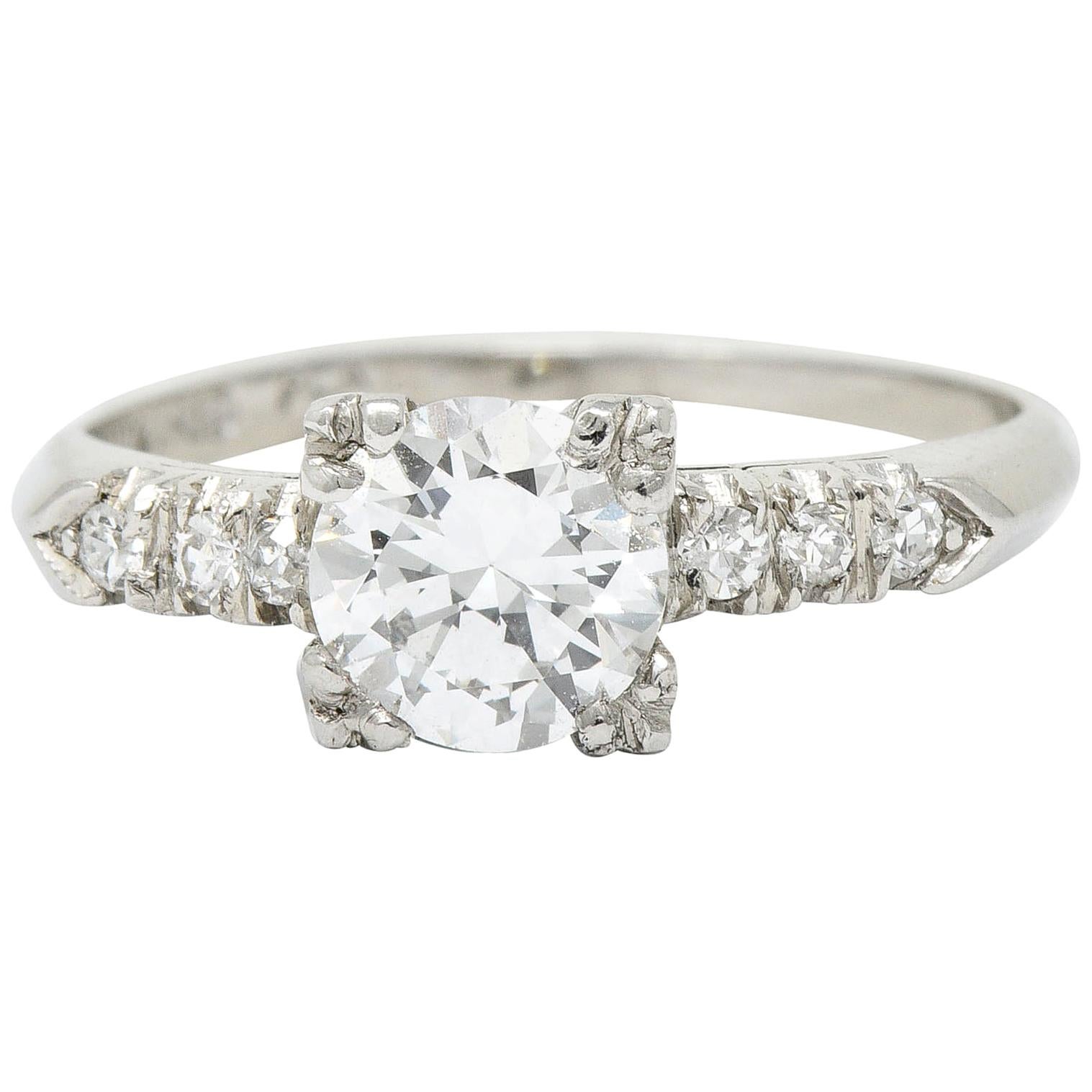 Retro 0.68 Carat Diamond Platinum Fishtail Engagement Ring For Sale