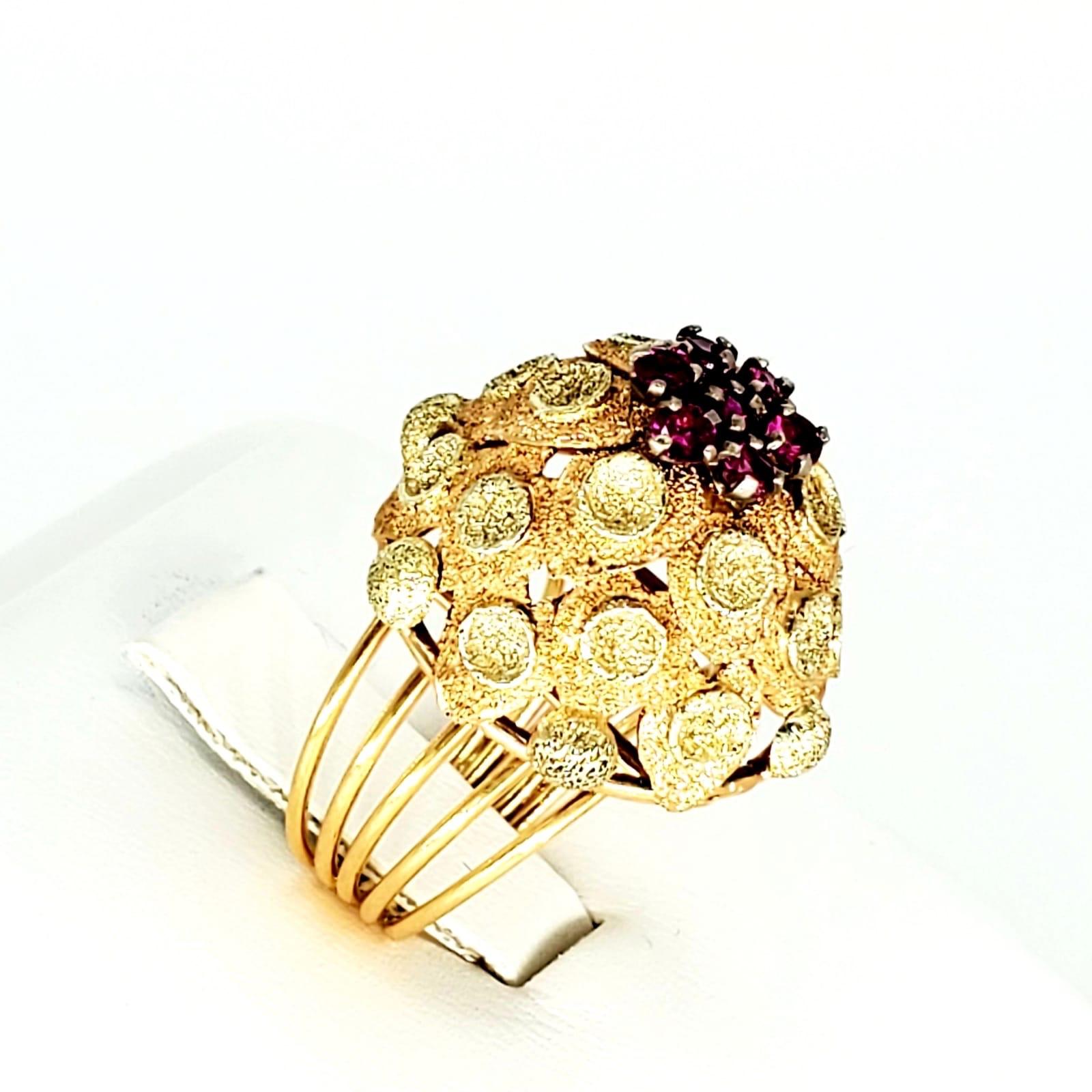 Retro 0.70 Carat Ruby Bombay Style Cocktail 18k Gold Ring. This ring is a one of a kind Bombay style ring thats amazingly designed and crafted in style of a leave/flower. The features approx 0.70 carat Ruby’s and is make of 18k solid gold. The ring