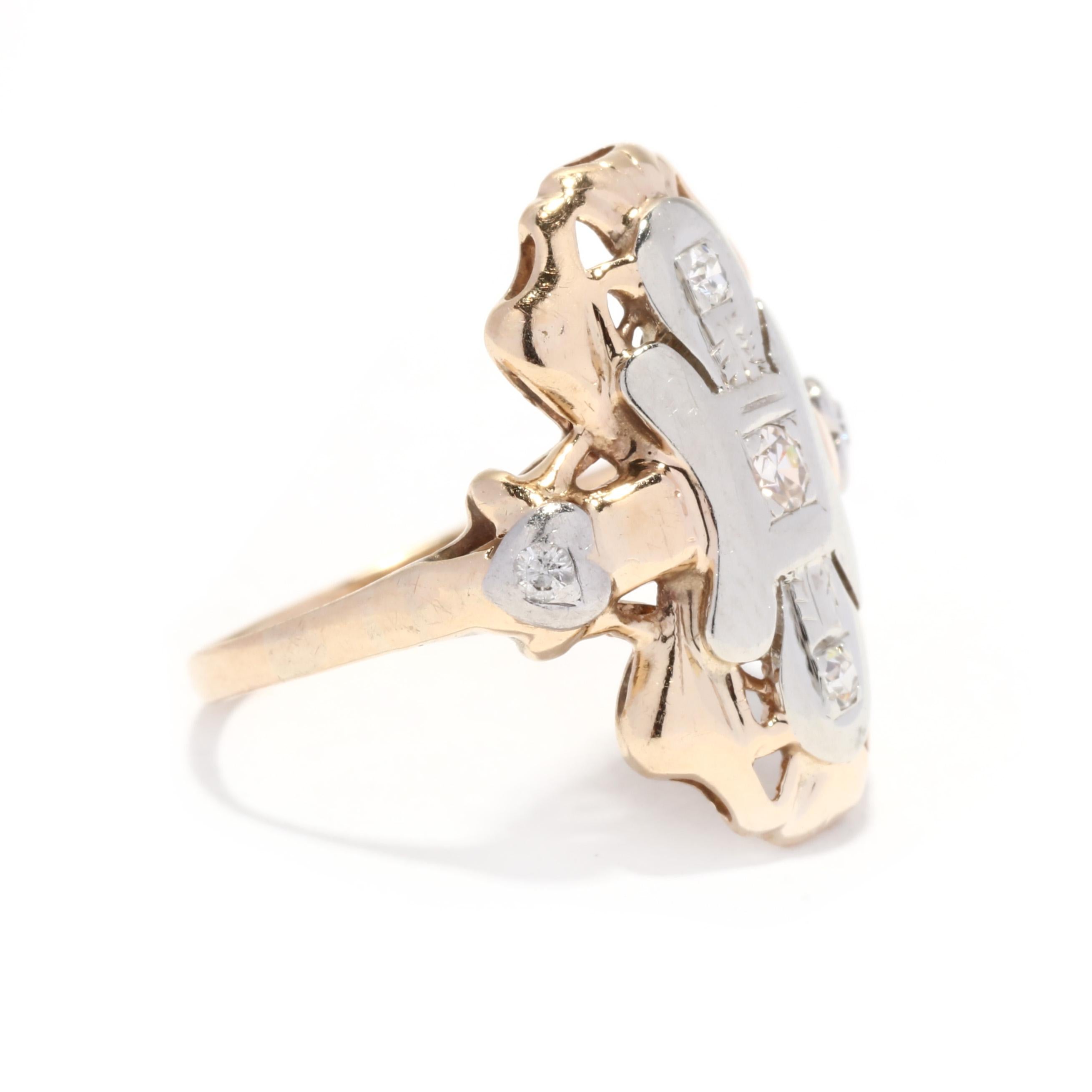 A retro 10 kart bi color gold diamond long dinner ring. This statement ring features a vertical bow shape in bi color gold, set with single cut round diamonds weighing approximately .07 total carats and with a tapered band.

Stones:
- diamonds, 5