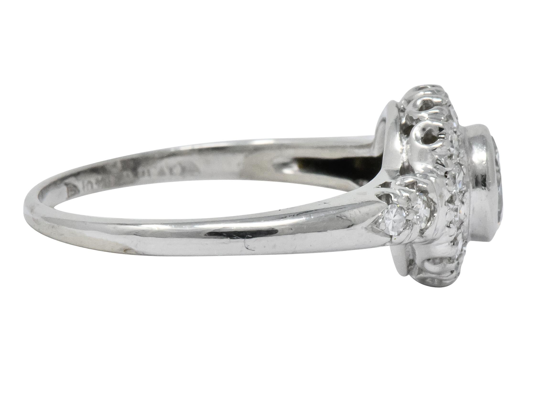Retro 0.80 Carat Diamond Platinum Cluster Engagement Ring In Excellent Condition In Philadelphia, PA