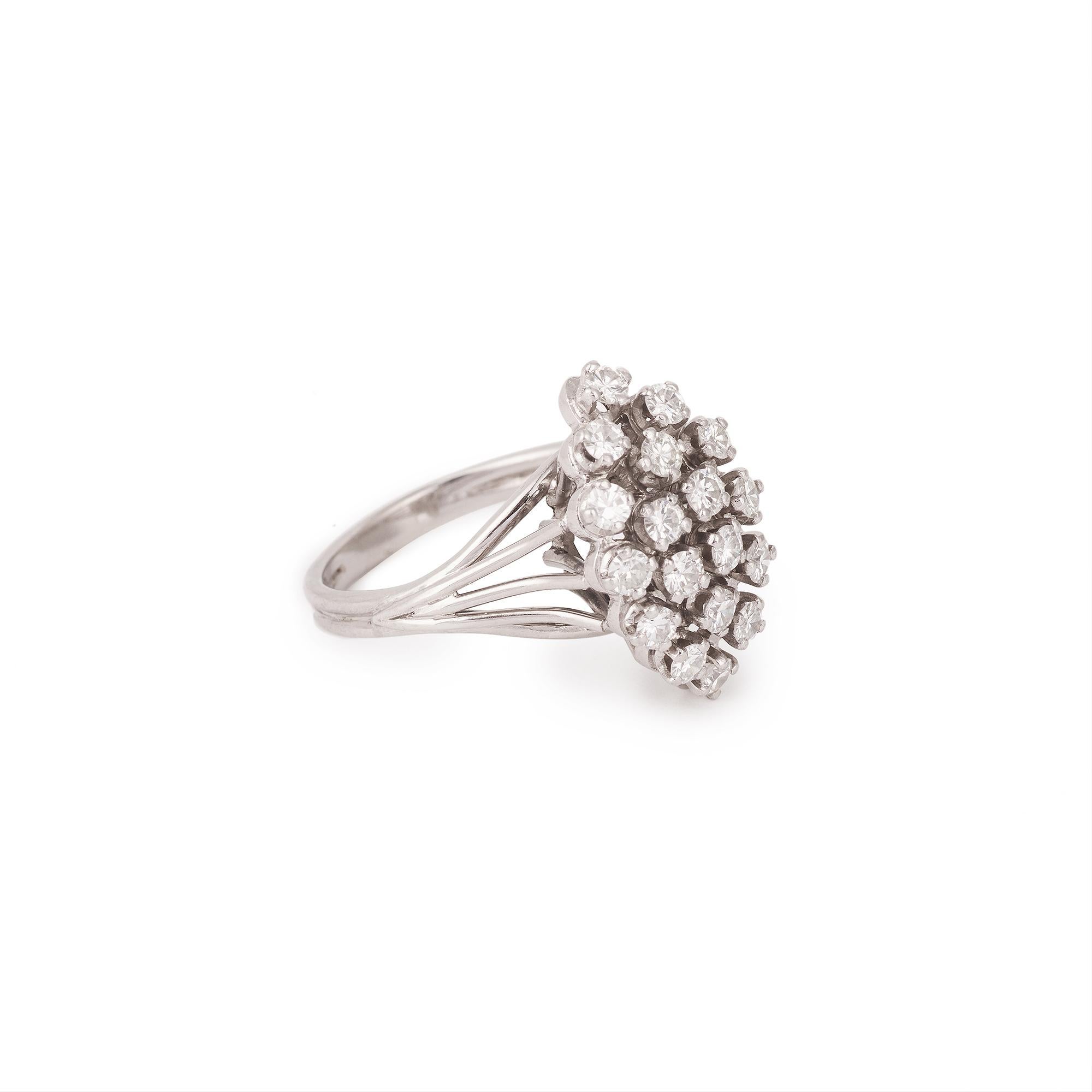 Elegant ring in white gold and platinum set with a large pavement of diamonds forming a marquise

Total approx weight of diamonds : 1.10 carats

Finger size : 58 (US size : 8 1/2)

Dimensions: 20.53 x 12.39 x 9.60 mm (0.806 x 0.488 x 0.378