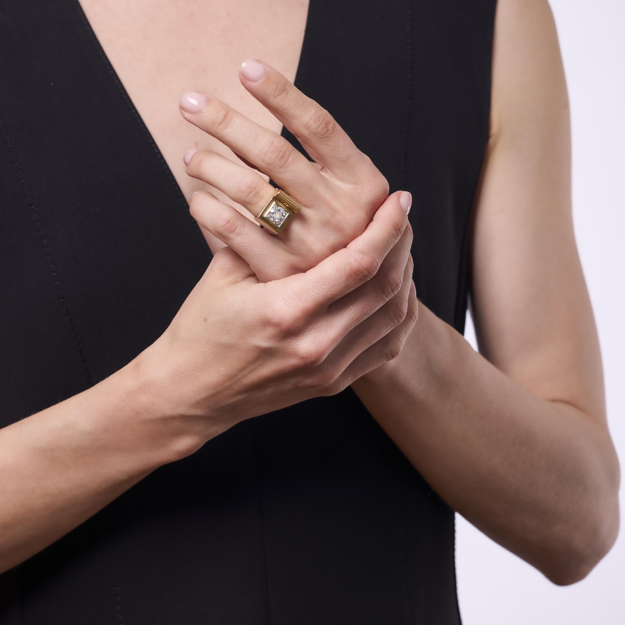 This bold Retro Tank ring features a 1.30 carat old European cut diamond set in gleaming 18k yellow gold with platinum details. A striking 1940s design that captures strength, glamour, and vintage sophistication.