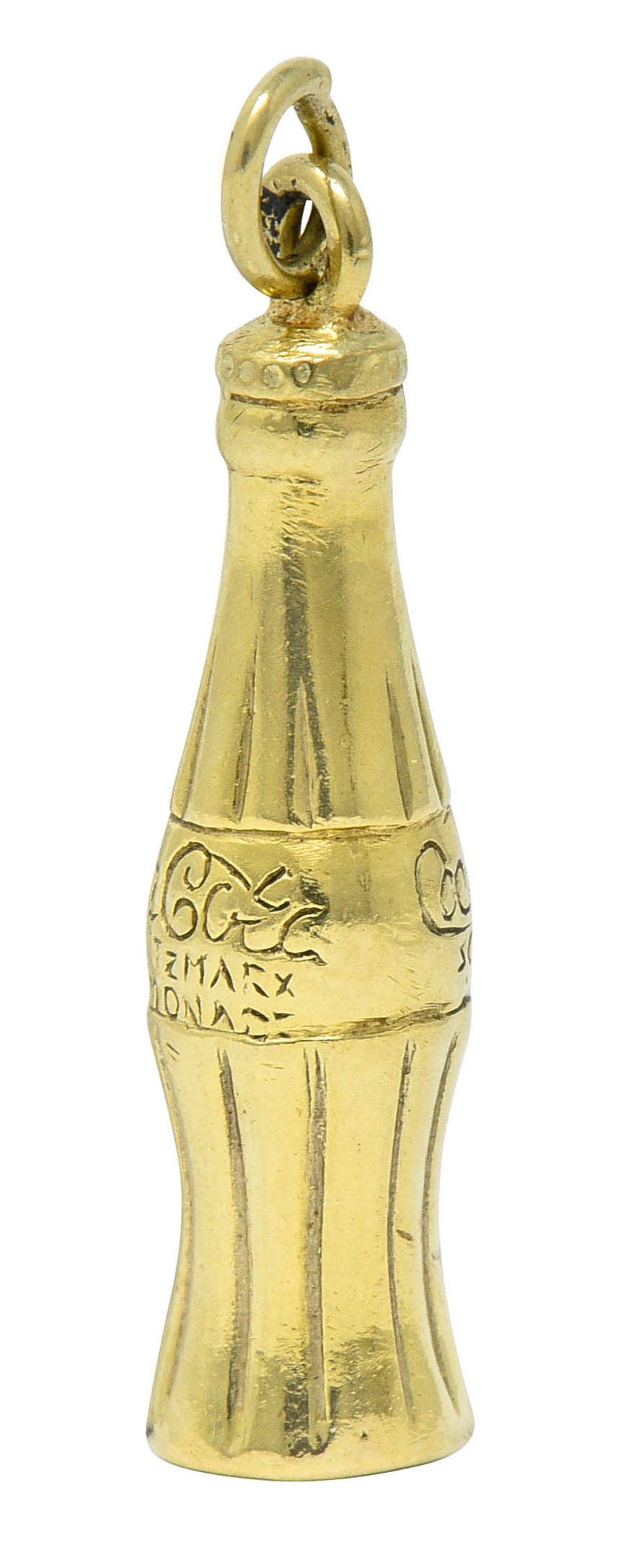 gold coca cola bottle