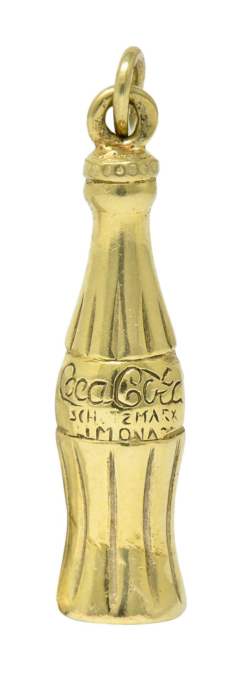 gold coke bottle