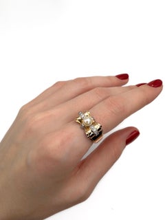 Anello da cocktail retrò a forma di arco con perle e diamanti in oro 14 carati