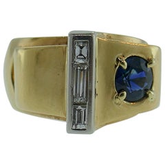 Retro 14 Karat Rose and White Gold, Baguette Diamond and Sapphire Ring