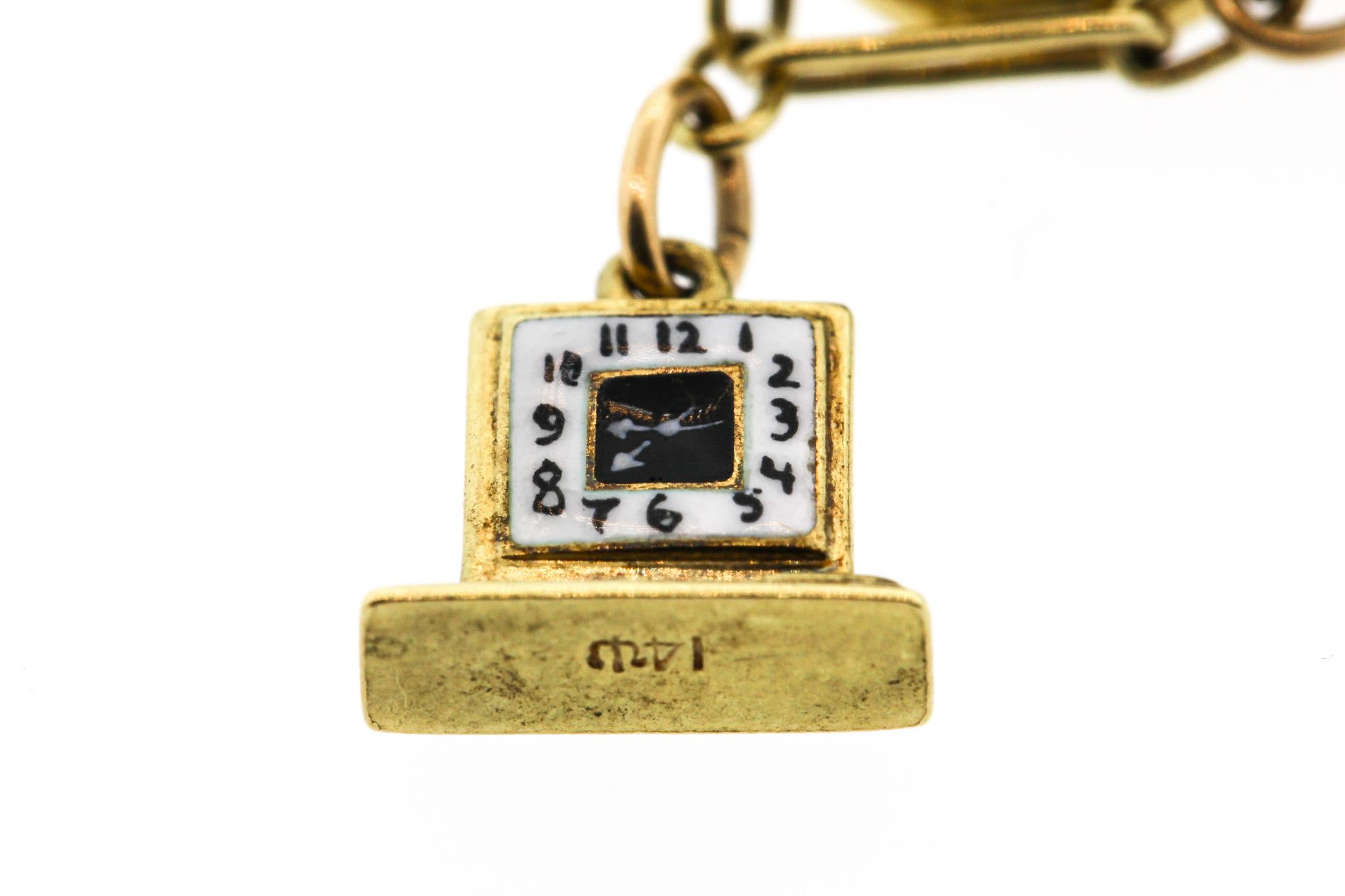 Retro 14 Karat Yellow Gold Charm Bracelet with Moving Charms 1