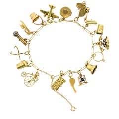  Vintage 14 Karat Yellow Gold Charm Bracelet with Moving Charms