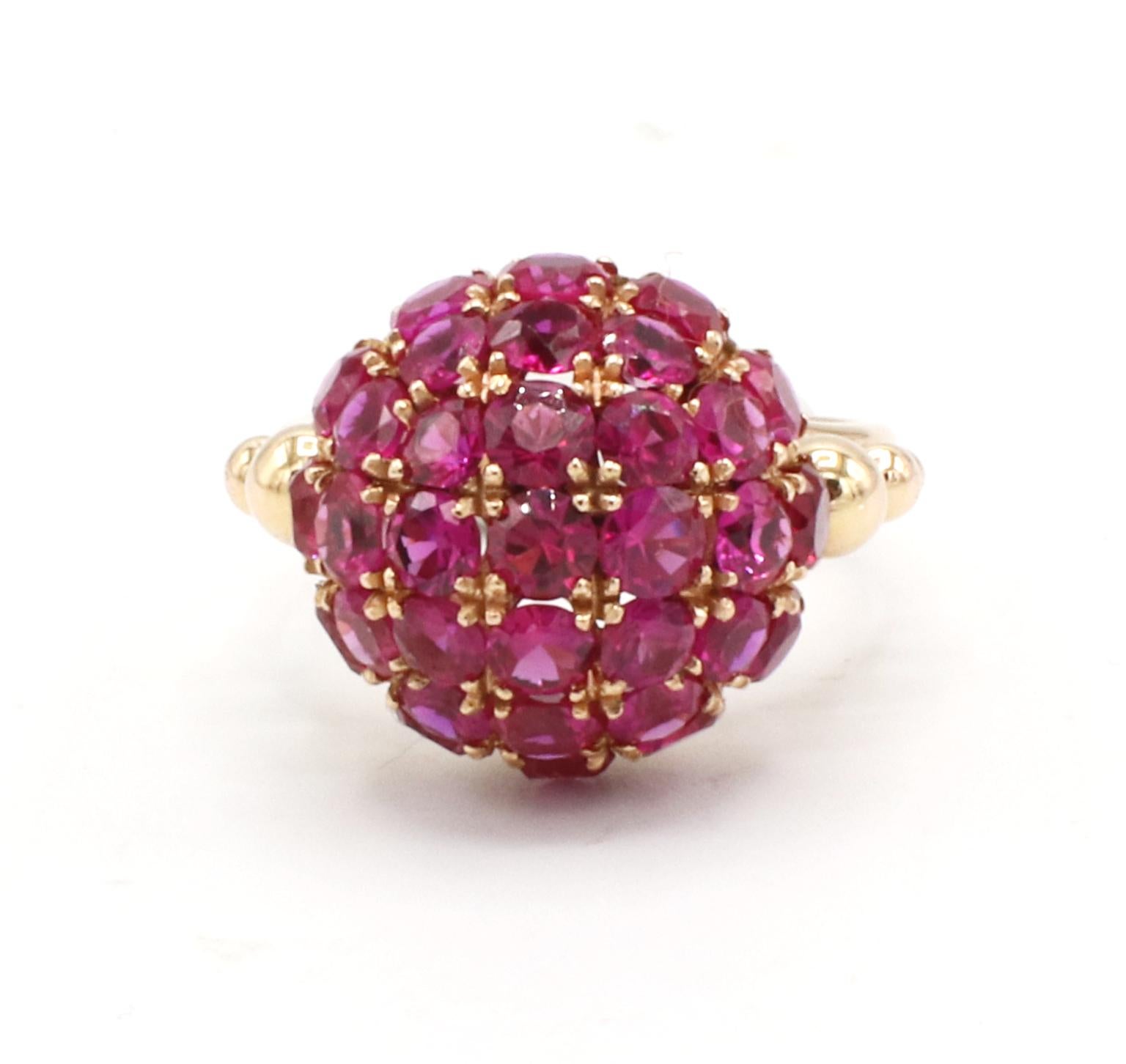 Retro 14 Karat Yellow Gold Ruby Round Stone Cluster Dome Ring 
Metal: 14k yellow gold
Weight: 7.13 grams
Top: 15.5 x 15.5mm
Size: 5.75 (US)
Height: 12.5mm
