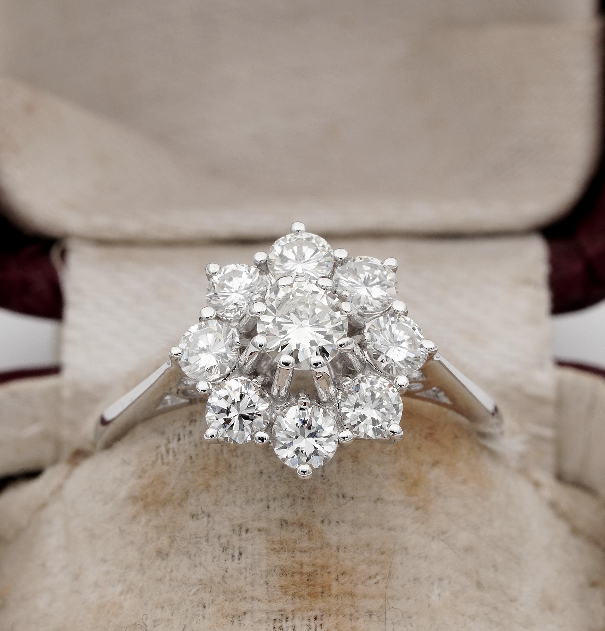 Superb Retro ring
Hand crafted mount accurately made of solid 18 KT white gold, 1945 ca –
Daisy shape with gorgeous under-gallery work, overwhelmed by a selection of 9 bright white  brilliant cut Diamonds of top quality
Diamonds are  1.45 Ct. G VVS