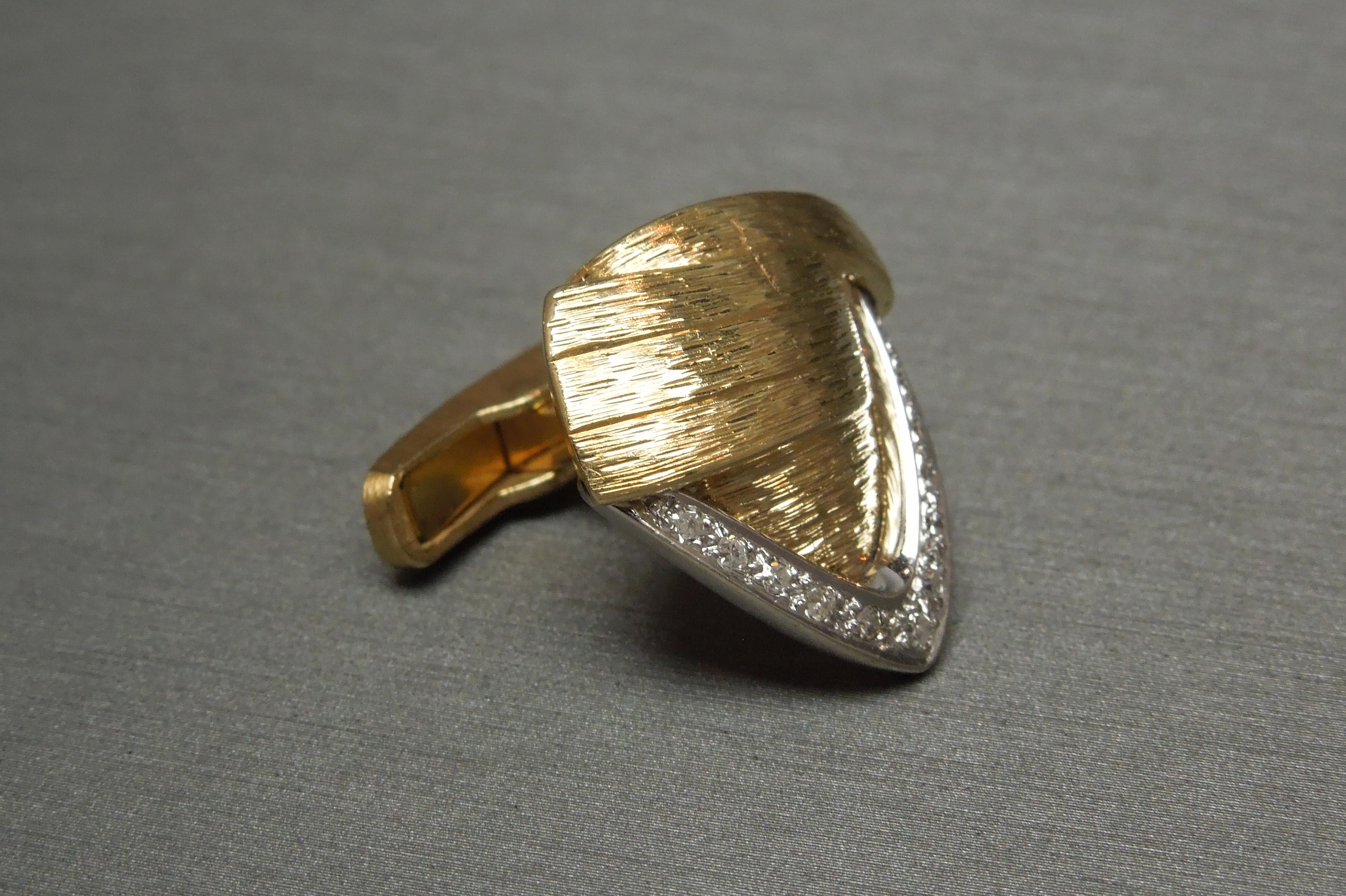 These Unisex 14KT Gold Diamond Cuff Links are constructed in a Retro triangular cuffed design, with a textured detail throughout. Predominantly Yellow Gold with White Gold sections containing a total of 0.80 carats of Nearly Colorless Nearly
