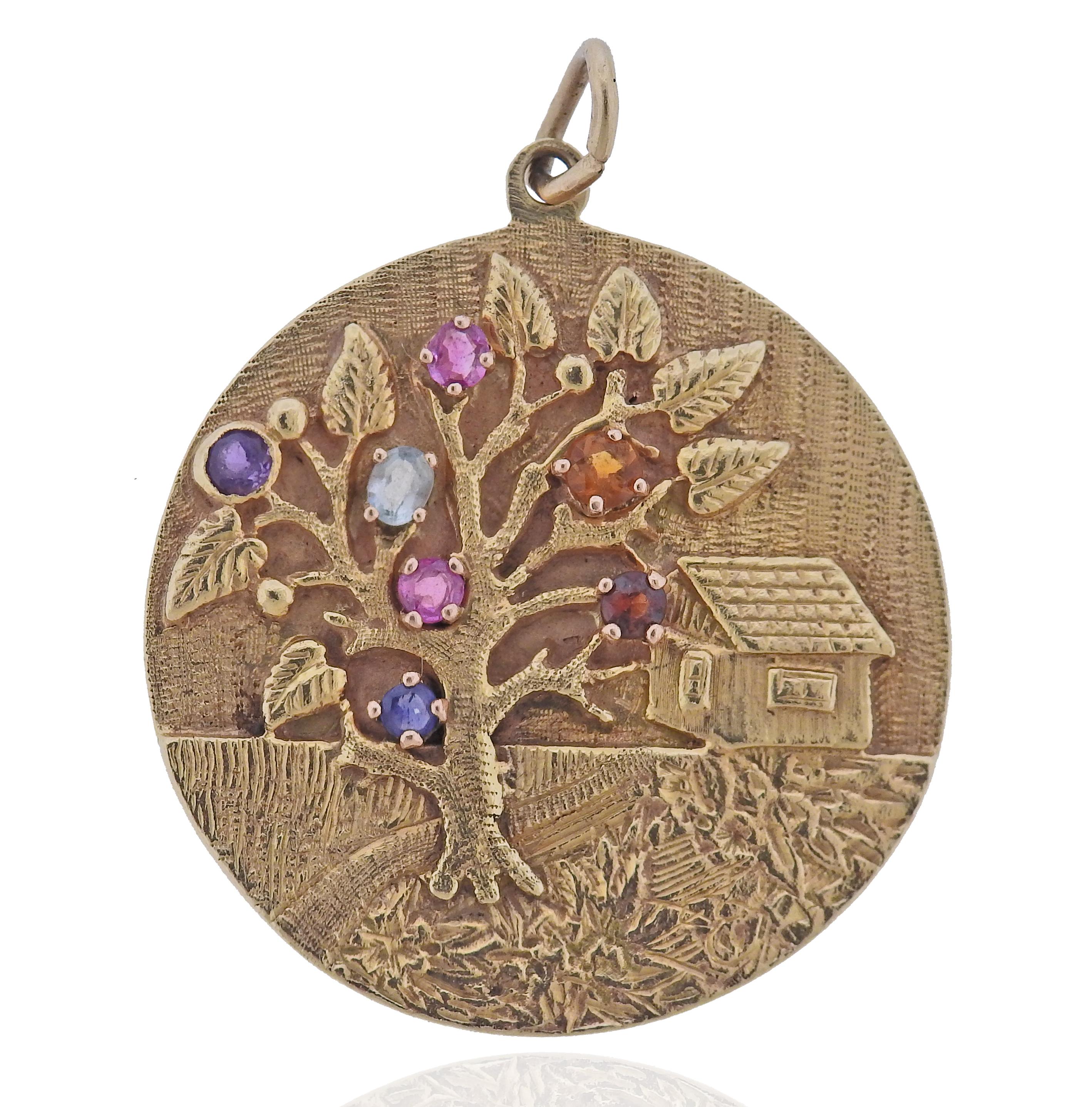 Retro 14k gold medallion pendant charm, with amethyst, sapphire, ruby, citrine, garnet and topaz. Pendant is 38mm in diameter. Marked 14k. Weight 22.4 grams. 