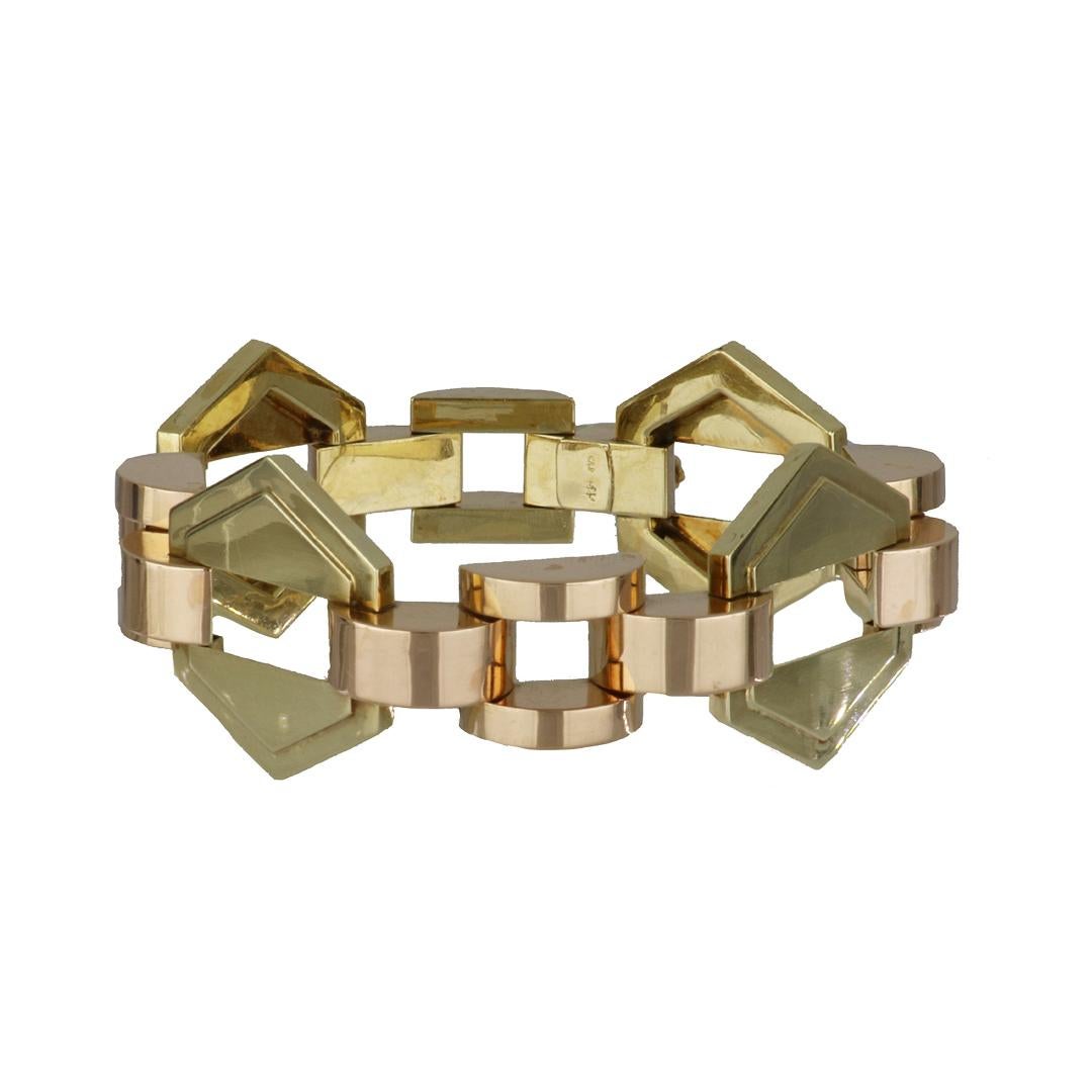 Retro Viennese geometric link bracelet comprised of alternating groups of four half-domed 14K rose gold links and stepped hexagonal 14K yellow gold links. Measures 7 1/2 inches in length.  Austrian, circa 1940.