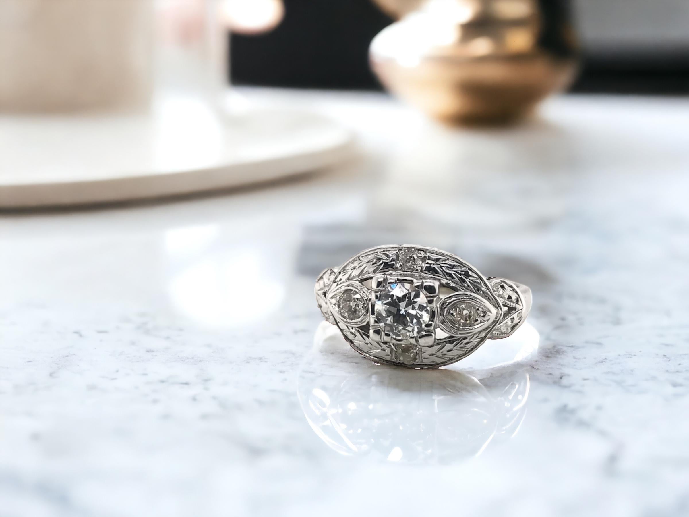 This lovely vintage ring will make a perfect every day right hand ring!
We love how nice and low this ring sits to the finger.

Ring Details
Material: 14K White Gold
Era: 1940 - 1960
Head Length: 10.3mm
Head Width: 15.3mm
Head Height: 5.5mm
Weight: