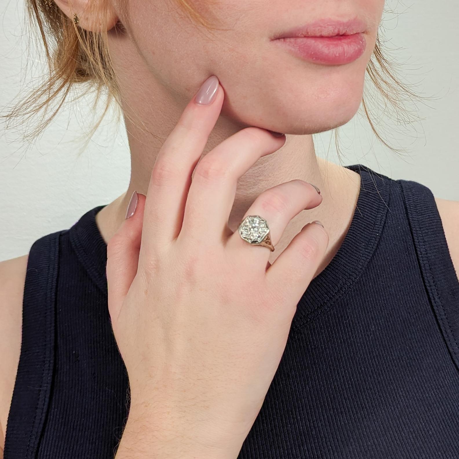 A fine retro diamond cluster ring.

In 14k white gold.

Center-set with a circa 0.3 carat Old European cut diamond (color: G-H, clarity: SI2) and surrounded by 8 Old European cut diamond with an approximate 0.64 CTW (color G-H, clarity VS-I1).