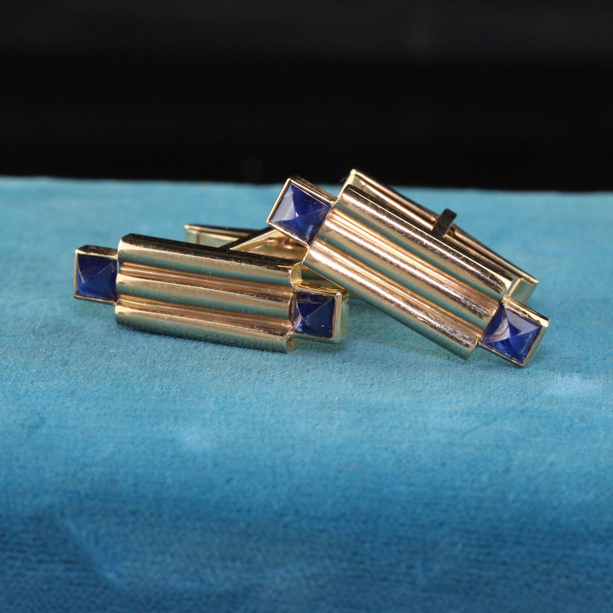 Beautiful Retro 14K Yellow Gold Sugarloaf Sapphire Geometric Cufflinks. These incredible pair of cufflinks are crafted in 14K yellow gold. They have 4 blue sugarloaf cut sapphires set on them and they are in great condition.

Item #C0012

Metal: 14K