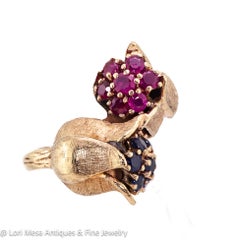 Retro 14kt Yellow Gold Ruby and Sapphire Floral Crossover Ring