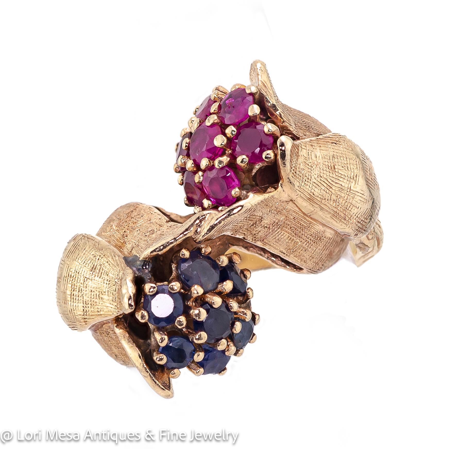 Round Cut Retro 14kt Yellow Gold Ruby and Sapphire Floral Crossover Ring For Sale
