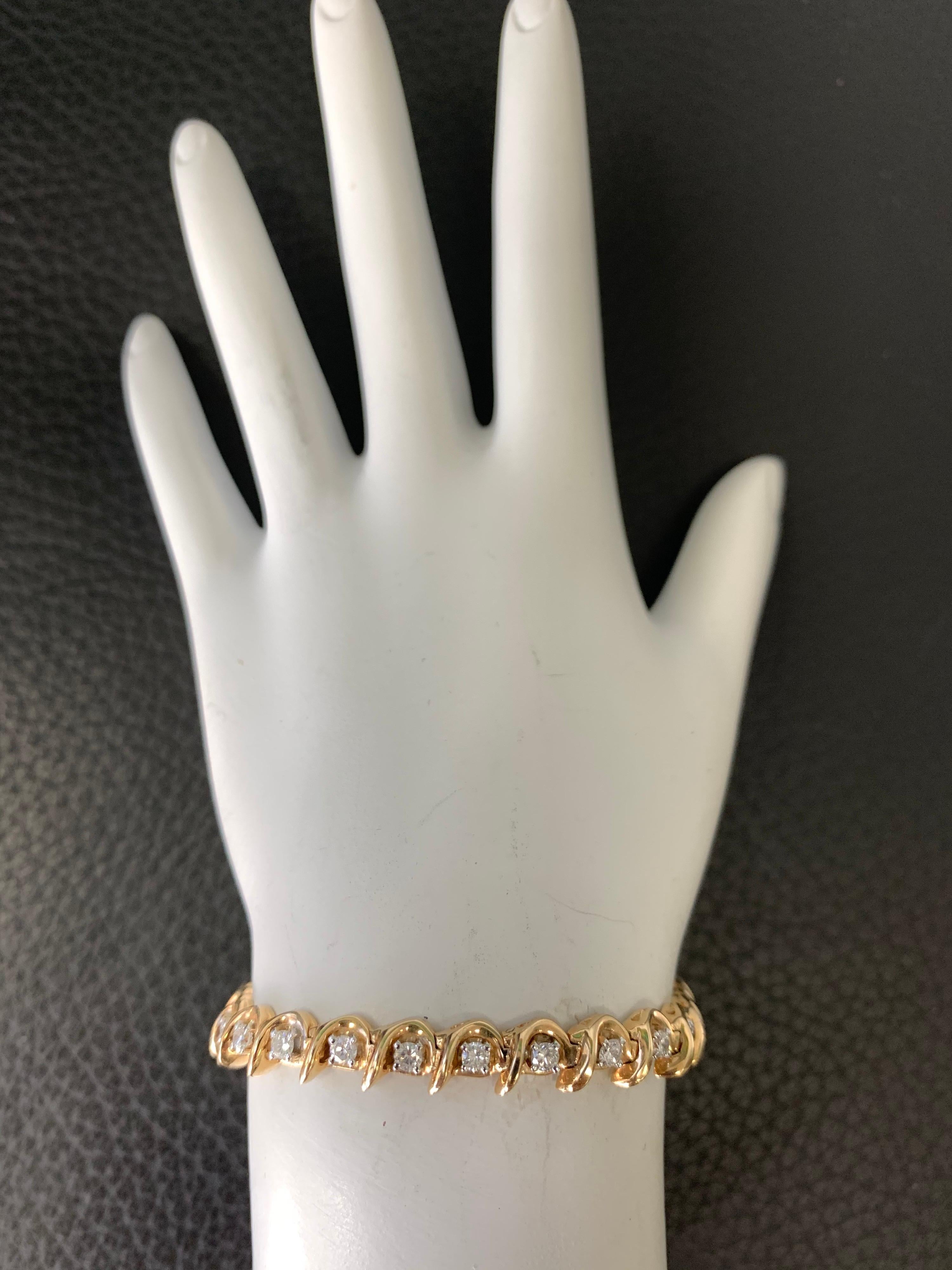 Stunning 1.75 Carat 14K Yellow Gold Natural Estate Diamond Bracelet set with 27 Natural Round Brilliant Diamonds approx G in color and VS-SI in clarity. 

The length of the piece is 7