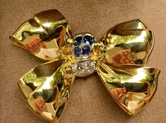 Retro 18 Karat Yellow Gold Bow Brooch with Sapphires and Diamonds