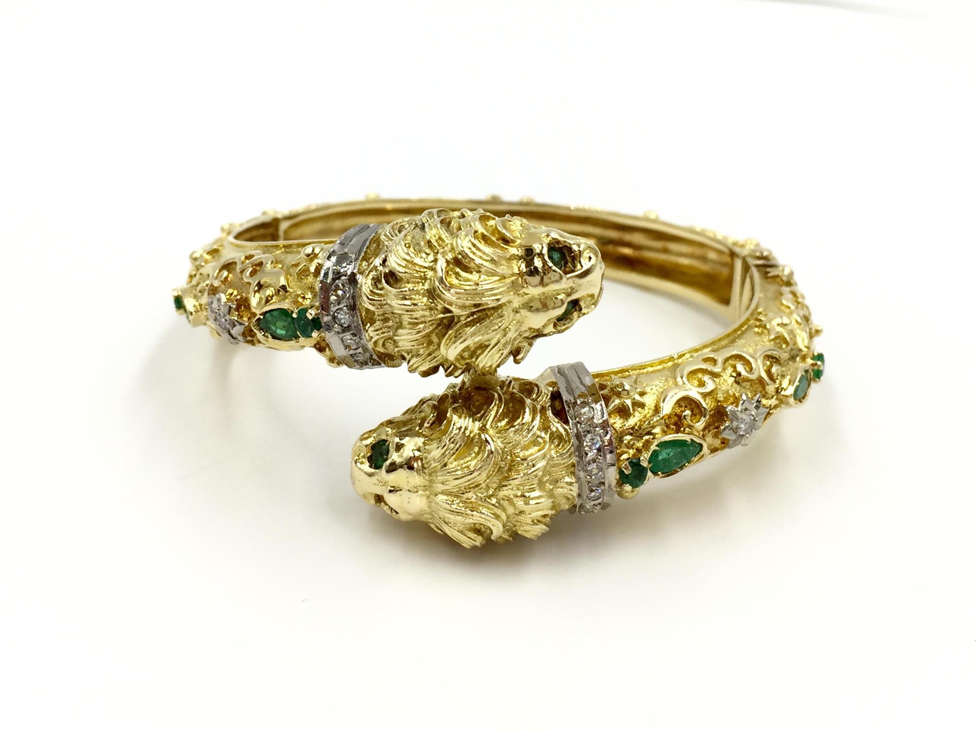 Retro 18 Karat Carved Lion Bangle with Diamonds and Emeralds In Good Condition In Pikesville, MD