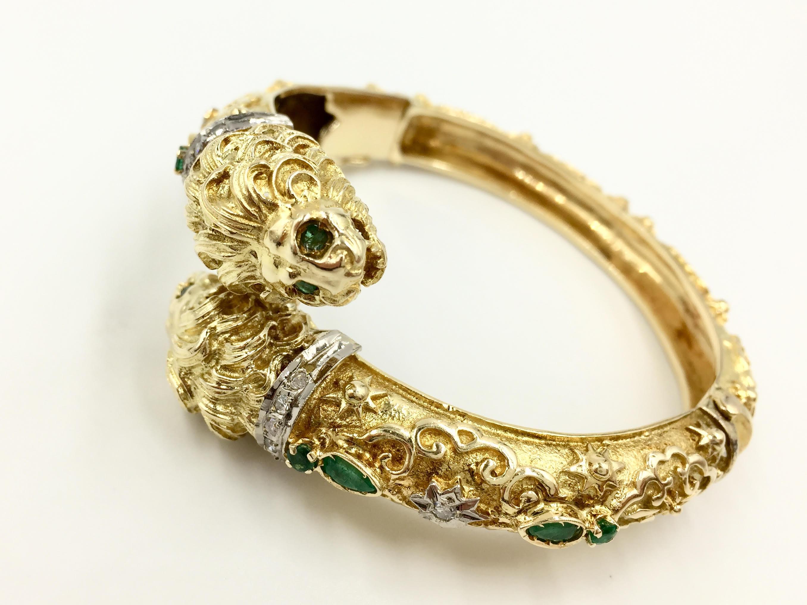 Retro 18 Karat Carved Lion Bangle with Diamonds and Emeralds 1