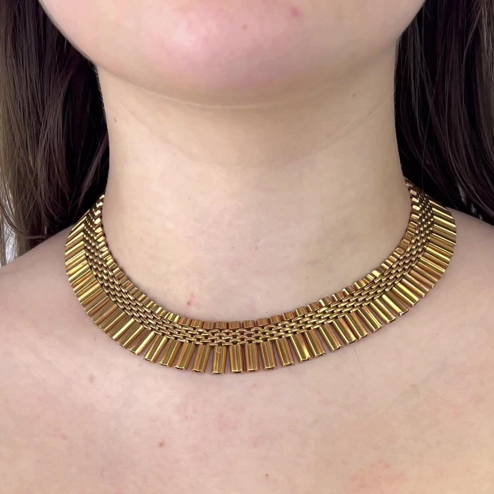 Retro 18 Karat Rose Gold Necklace. Crafted 18 karat rose gold, with purity marks. Circa 1940s. The necklace is 16 inches in length.

About this Item: This 1940's Rose Gold Necklace is a true stunner! With its chain-link texture and rose gold
