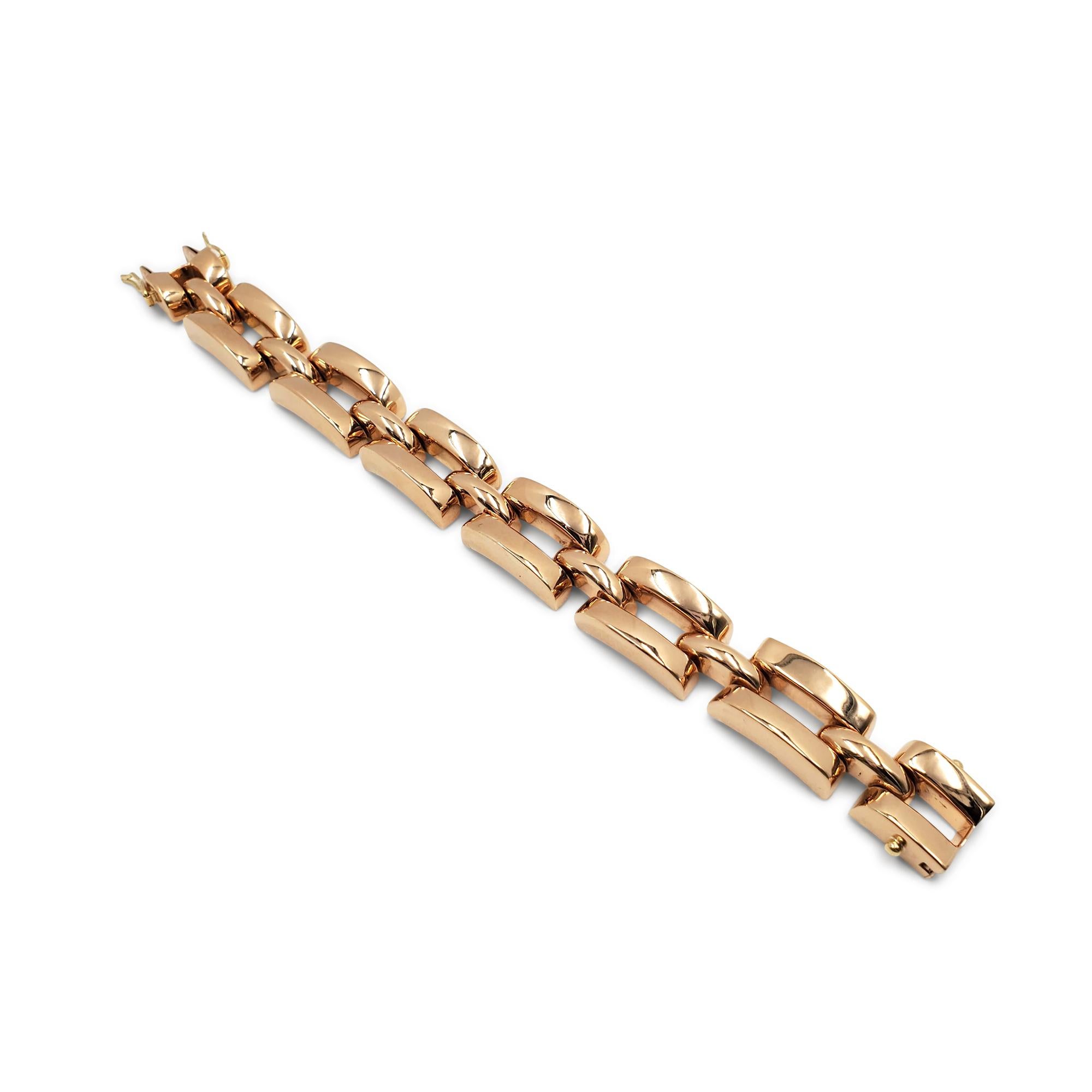 A chic retro tank track bracelet crafted in 18 karat rose gold.  The bracelet measures 7 3/4 inches in length and .63 inches in width with a box clasp.  Stamped 18K with maker's mark.  CIRCA 1940s

Metal: 18K Rose Gold
Condition: Excellent
Wear: