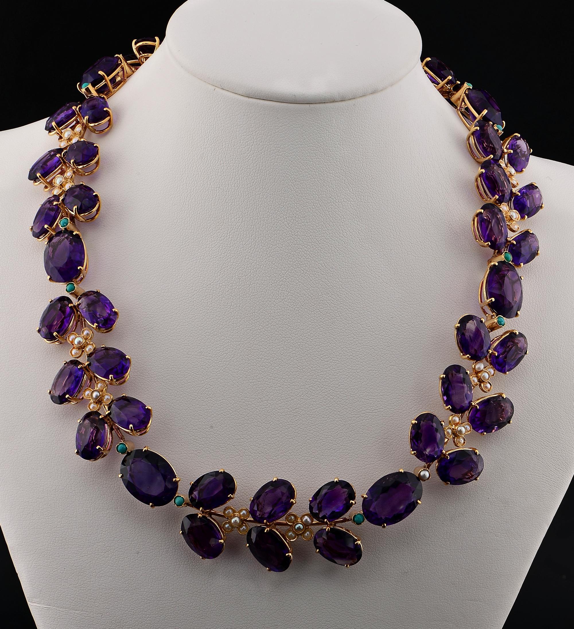 Mad for Amethysts!
This quite breathtaking vintage necklace is 1940 ca
Hand fabricated of solid 18 KT gold, bears the old Italian marks for pre 1940
The outstanding nature inspired design is composed by a high quality selection of Natural Amethysts