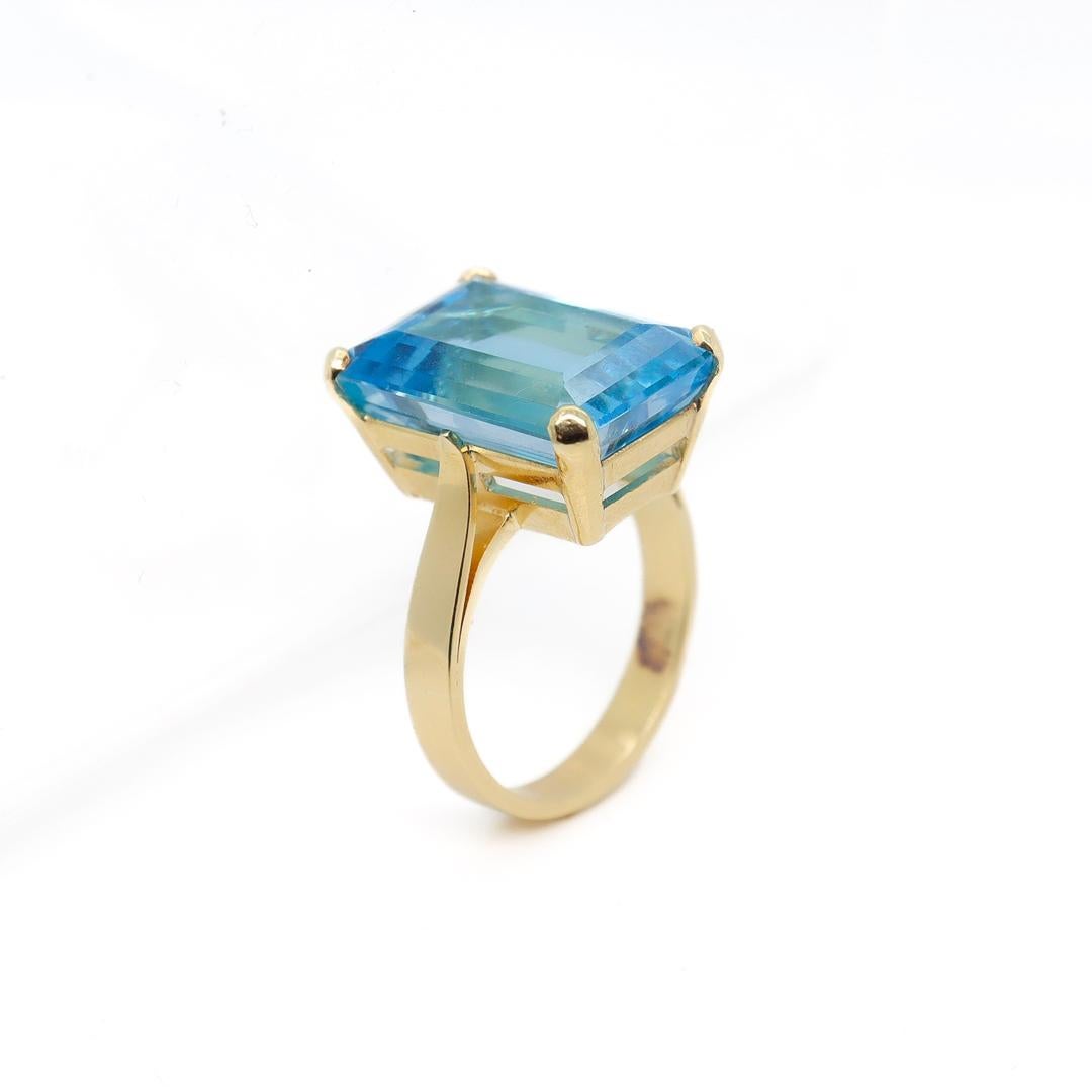 Retro 18K Gold and Emerald Cut Blue Topaz Cocktail Ring In Good Condition For Sale In Philadelphia, PA