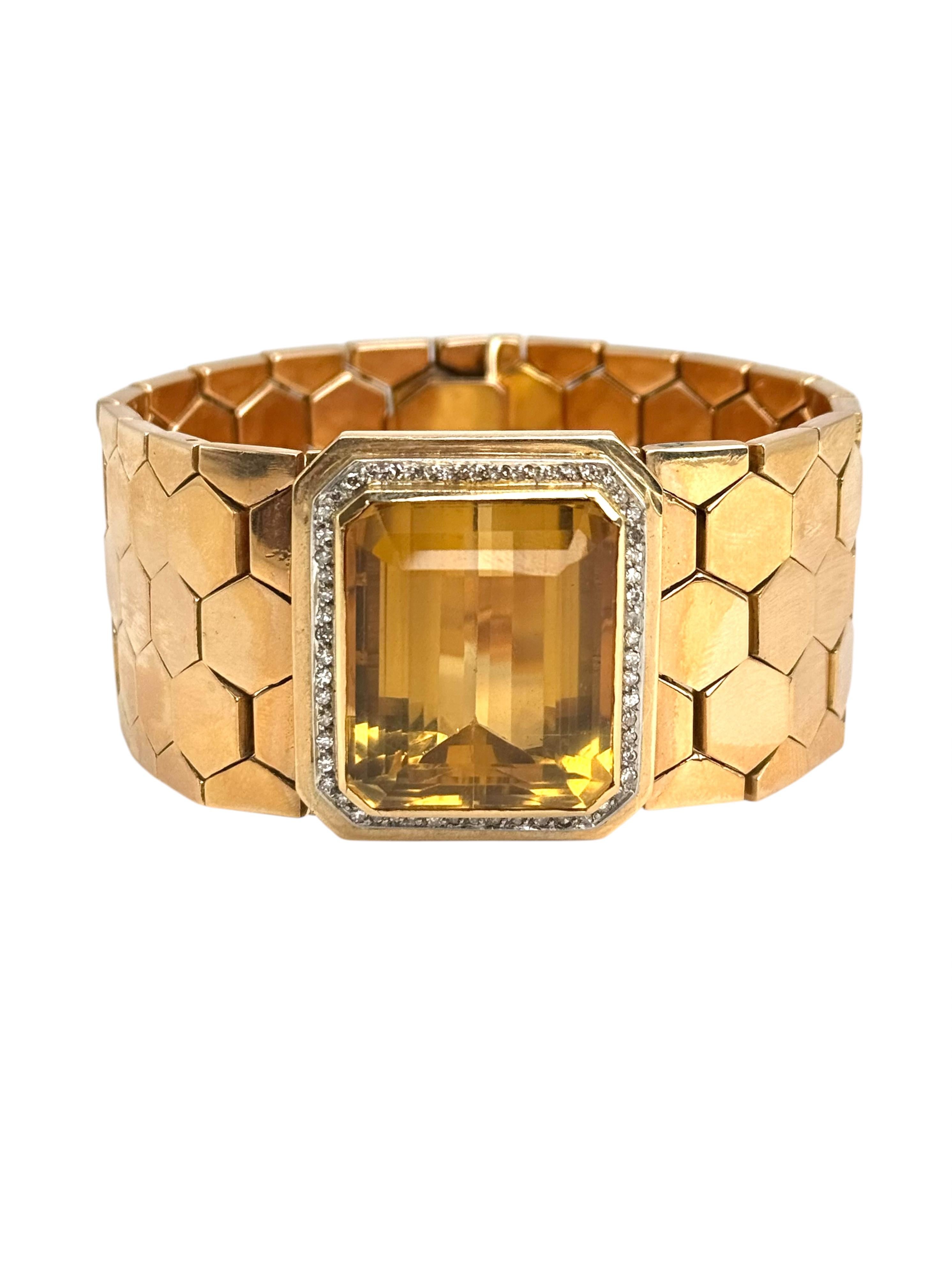 A bold statement of Retro-era glamour, this striking bracelet is crafted in richly hued 18K yellow gold with a unique honeycomb-link design. At its center sits a magnificent emerald-cut citrine, estimated at over 30 carats, radiating golden warmth