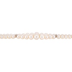 Pulsera retro de perlas y diamantes de 18 quilates de varias vueltas