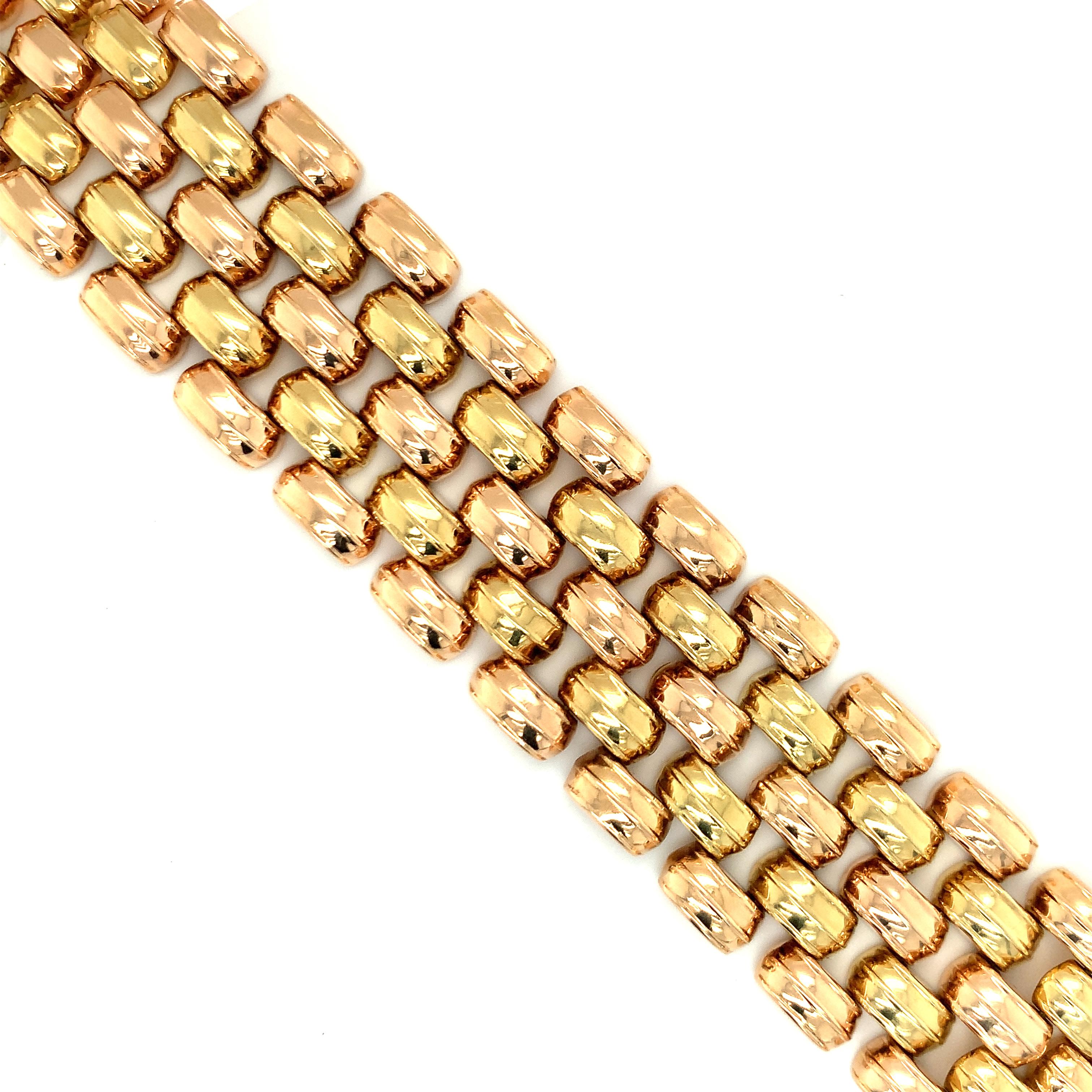 One Retro 18K tri-color gold wide-strap bracelet featuring rose, yellow, and green gold fluted oval links with a high polish finish. Flexible, comfortable, and made with bold design.

Flash, statement, hefty.

Metal: 18K yellow gold
Circa: Retro,