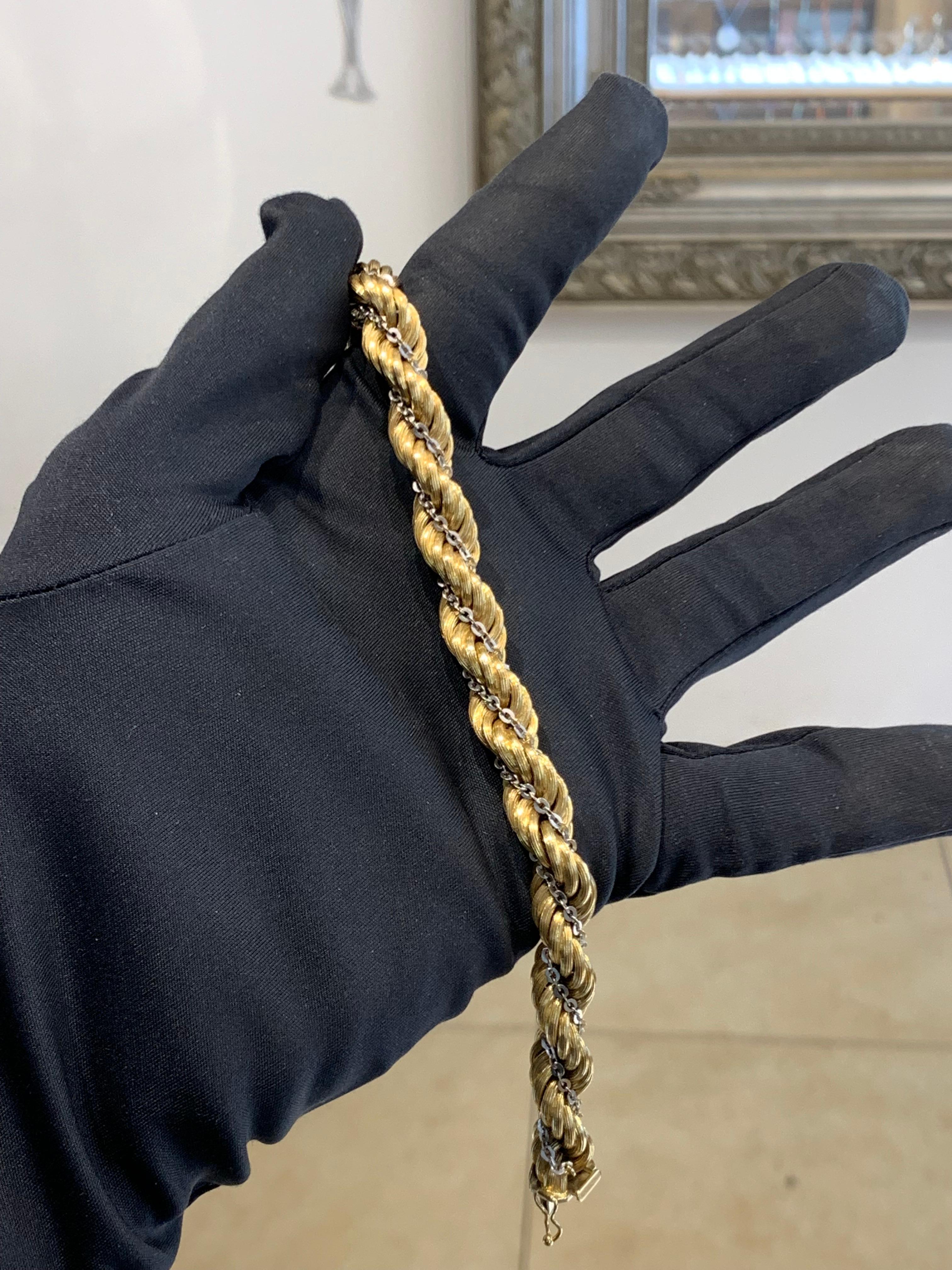 Beautifully Hand Crafted 18k Yellow & White Gold Italian Made Rope Bracelet.
Amazing Shine, Incredible Craftsmanship.
Great Statement Piece.
Comfortable Fit On The Wrist.
Very Popular.
