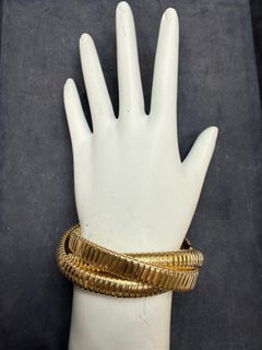 Bracciale flessibile retrò a tre fili in oro giallo 18K di Herco