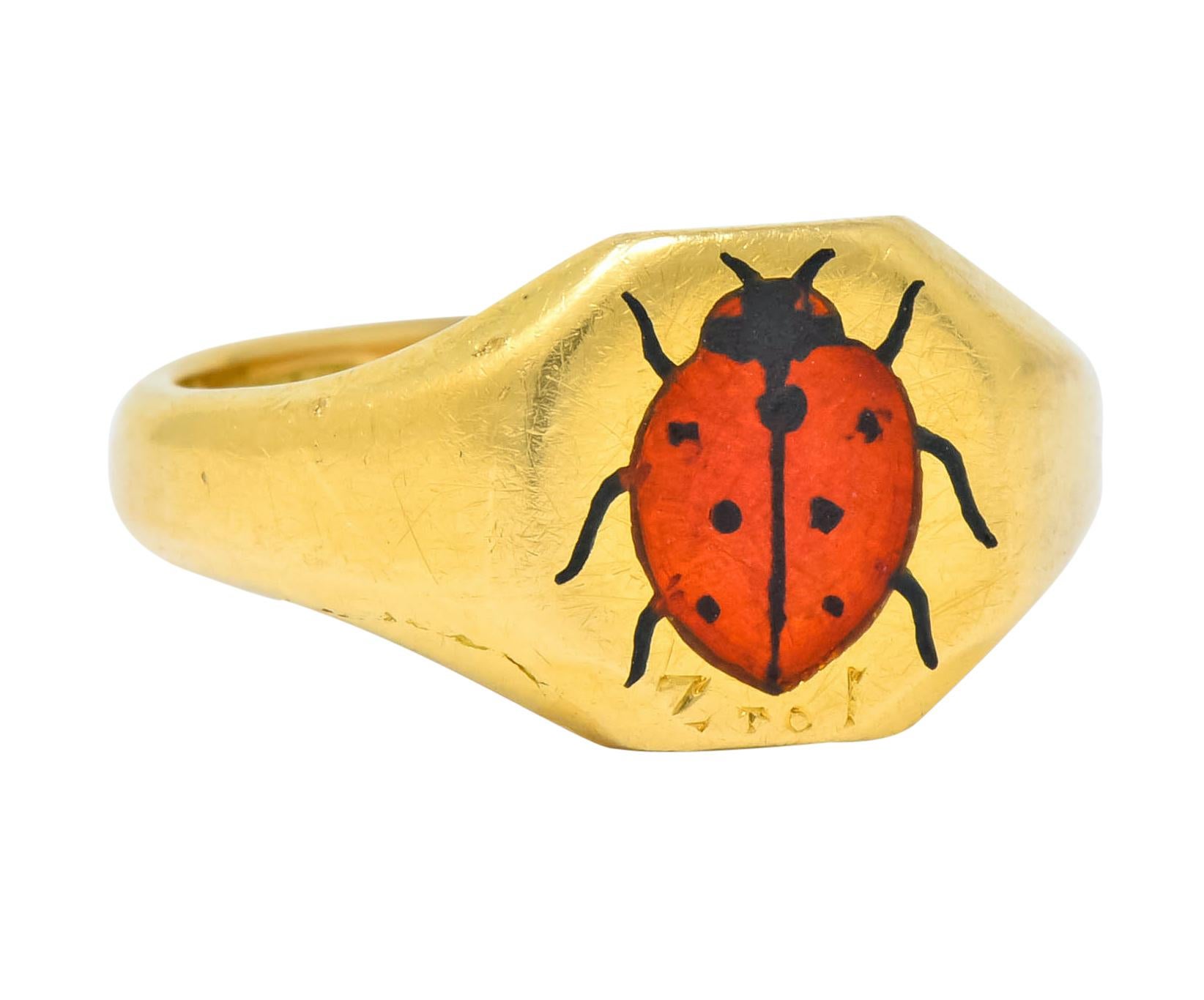 Signet style ring with a hexagonal shape depicting a red and black enamel ladybug showing no loss

Hand inscribed 'Z to I'

With maker's mark and British Hallmarks for 18 karat gold, Birmingham, circa 1938

Ring size: 4 & not sizable

Top measures: